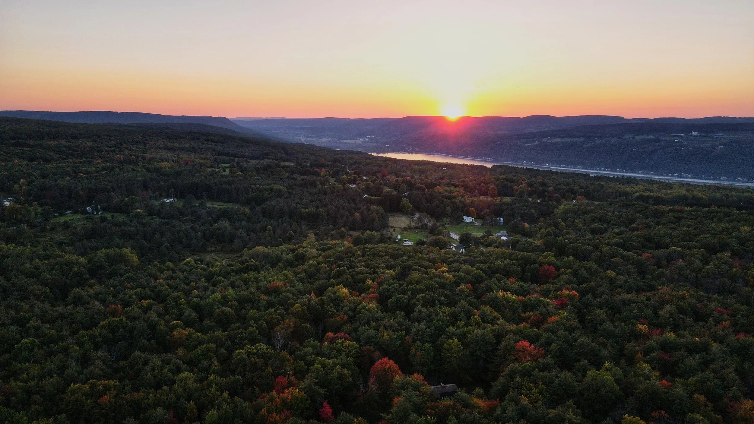Sunset over The Hideaway with Keuka Lake.jpeg