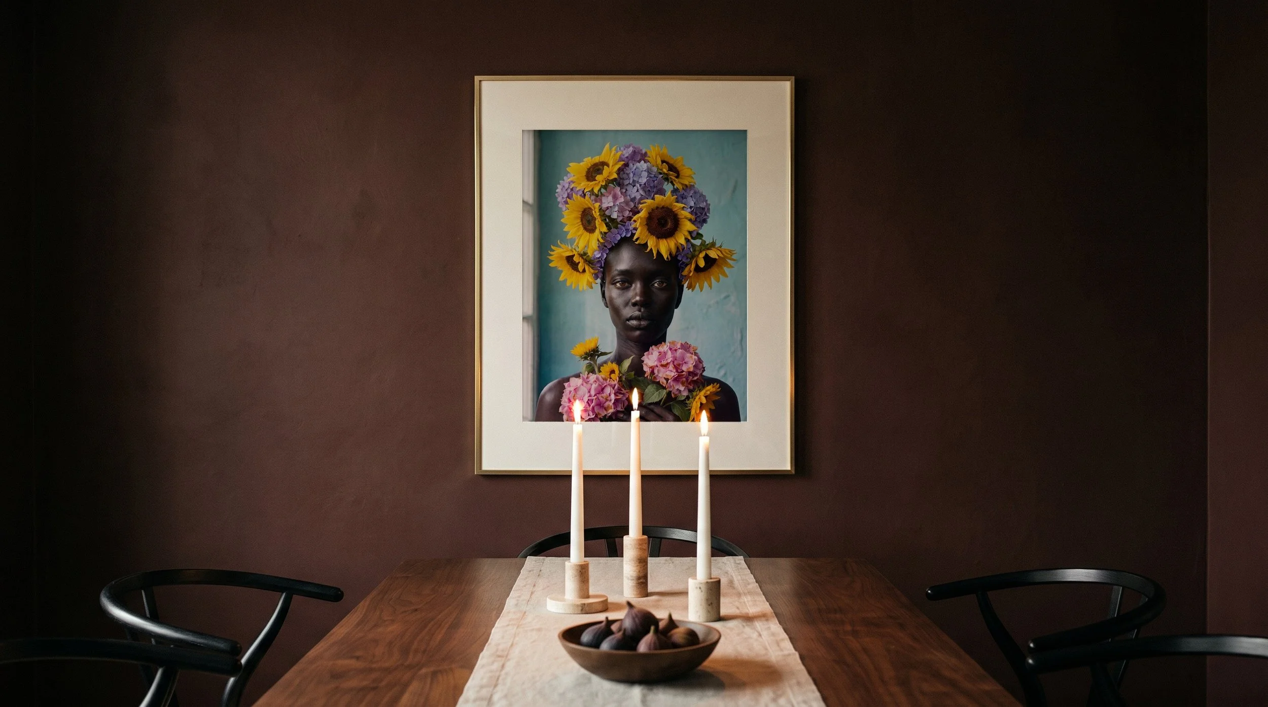Netta framed print on an oxblood dining room wall by candlelight