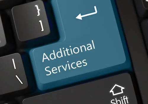 a partial keyboard showing the words additional services on the enter key