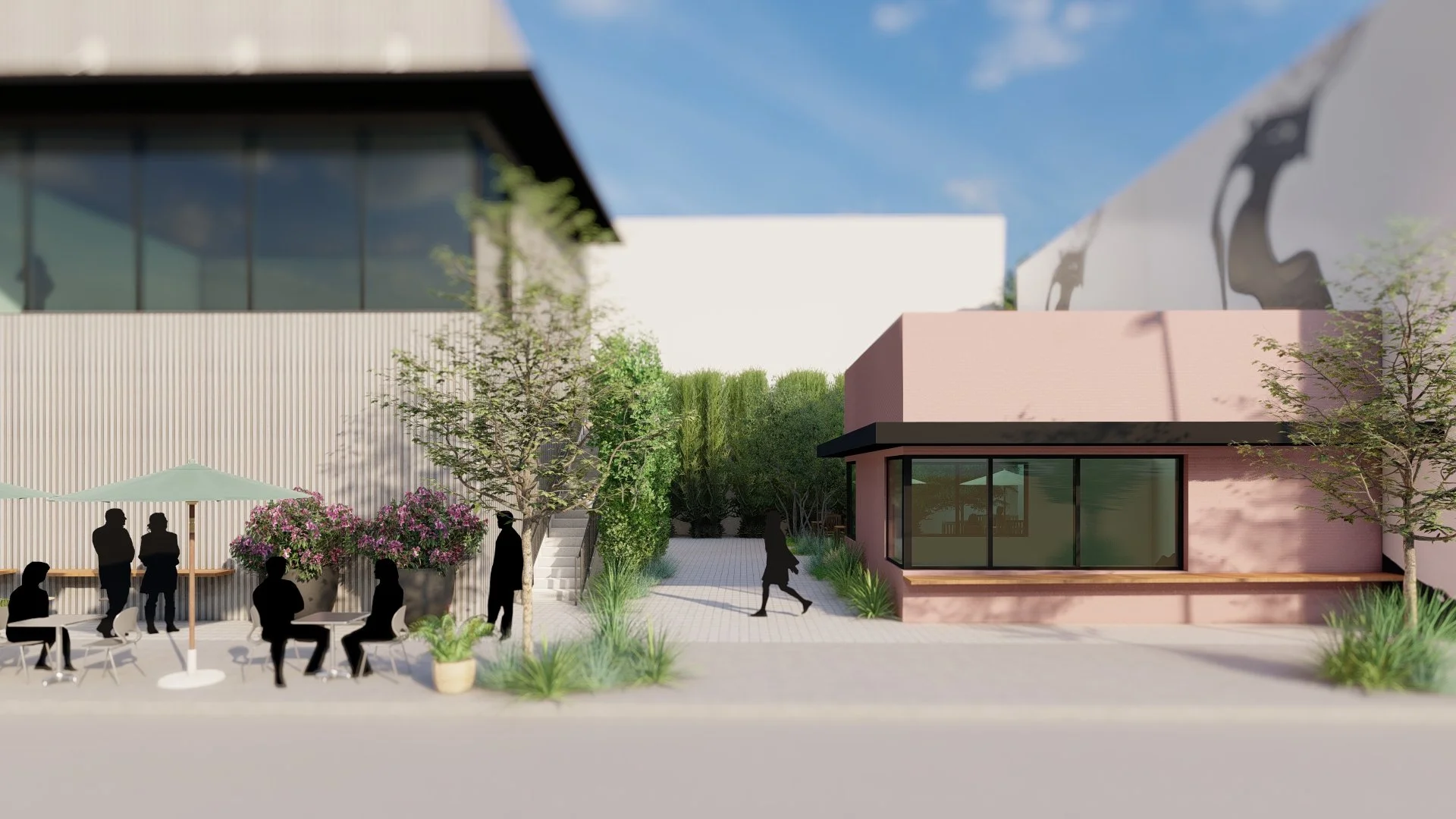 Street-level view of the West Adams complex featuring a vibrant coffee shop with outdoor sidewalk seating, activating the pedestrian corner.