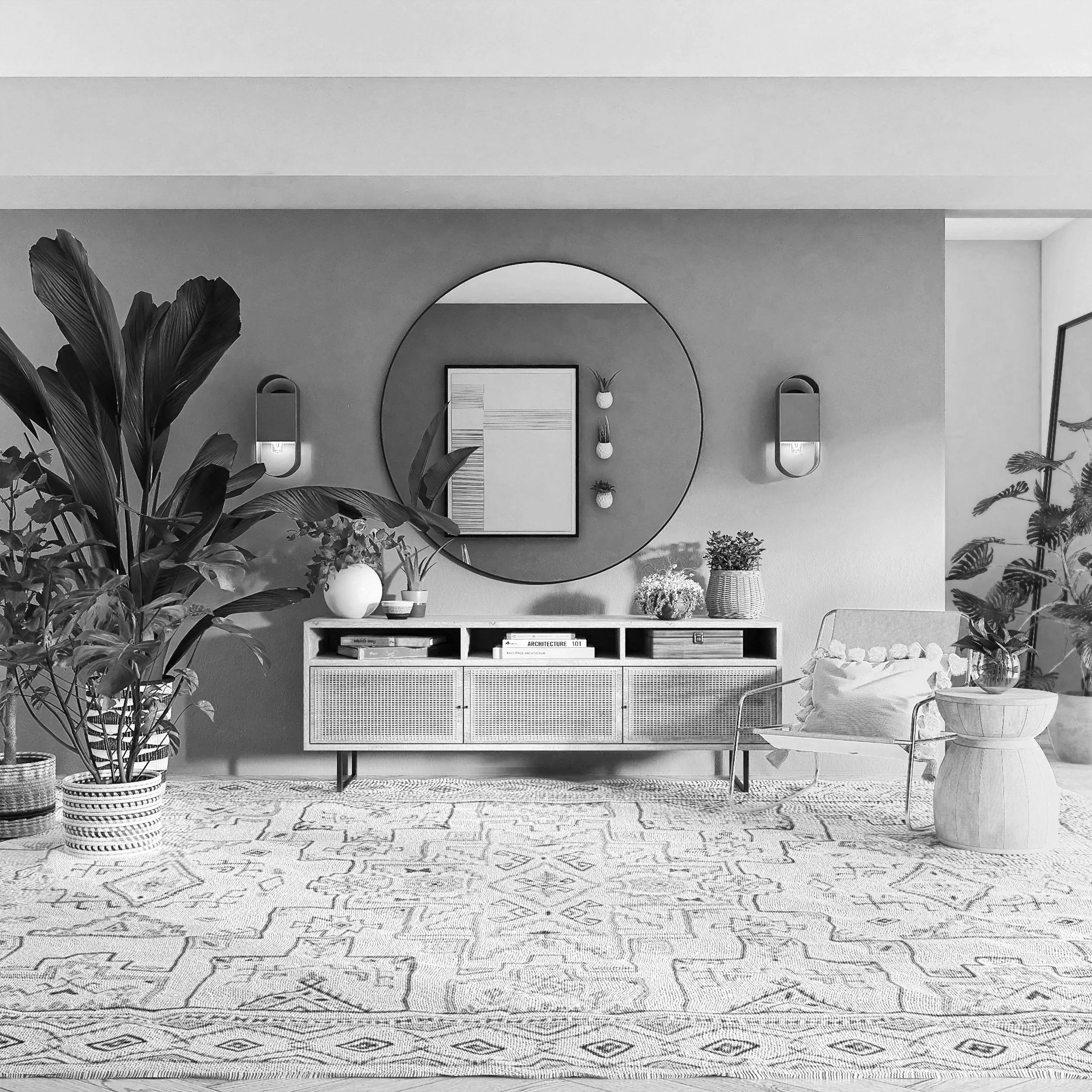 A modern living room with potted plants, a wall mirror, a sideboard with decor, and a chair with pillows; in black and white.