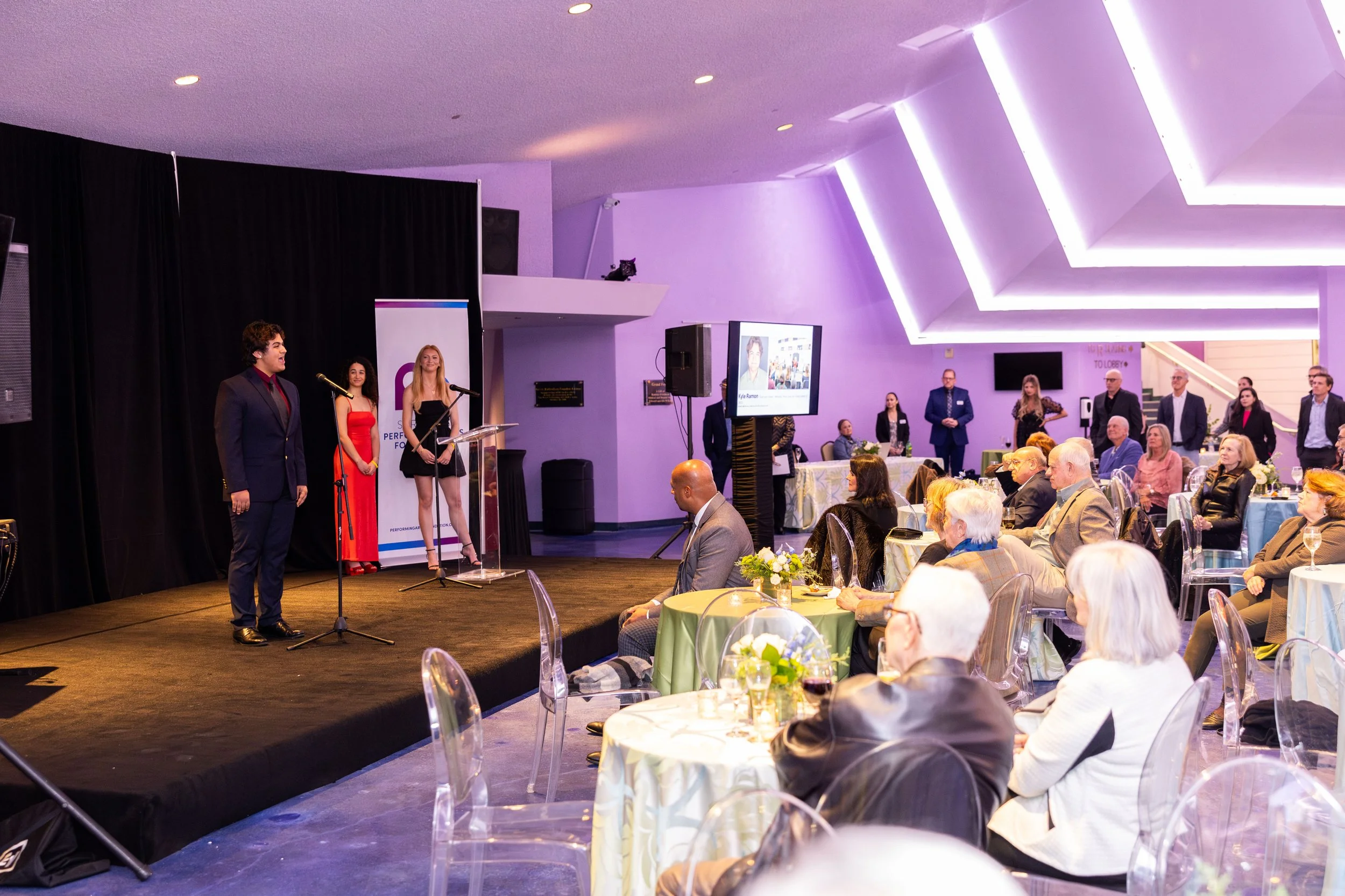 Young man performs for audience at Van Wezel Performing Arts Hall