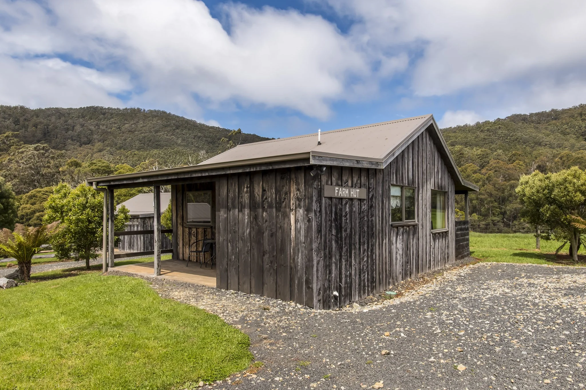 Accommodation in Penguin | Rustic Hut Bush Retreat | Exterior of The Farm Hut at Rustic Hut Bush Retreat