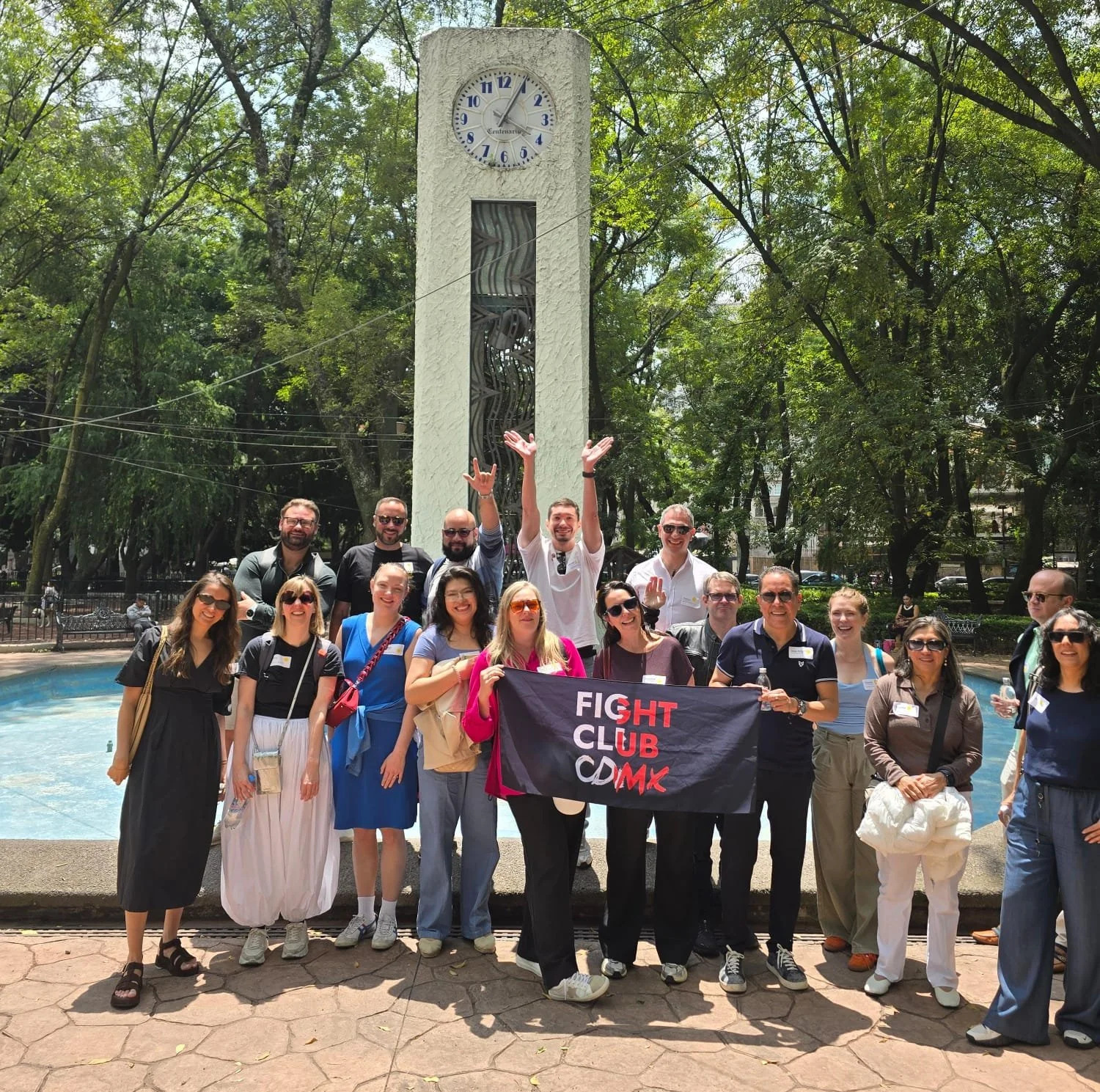 Participants visiting a contemporary art gallery during a networking walk in Mexico City.jpeg