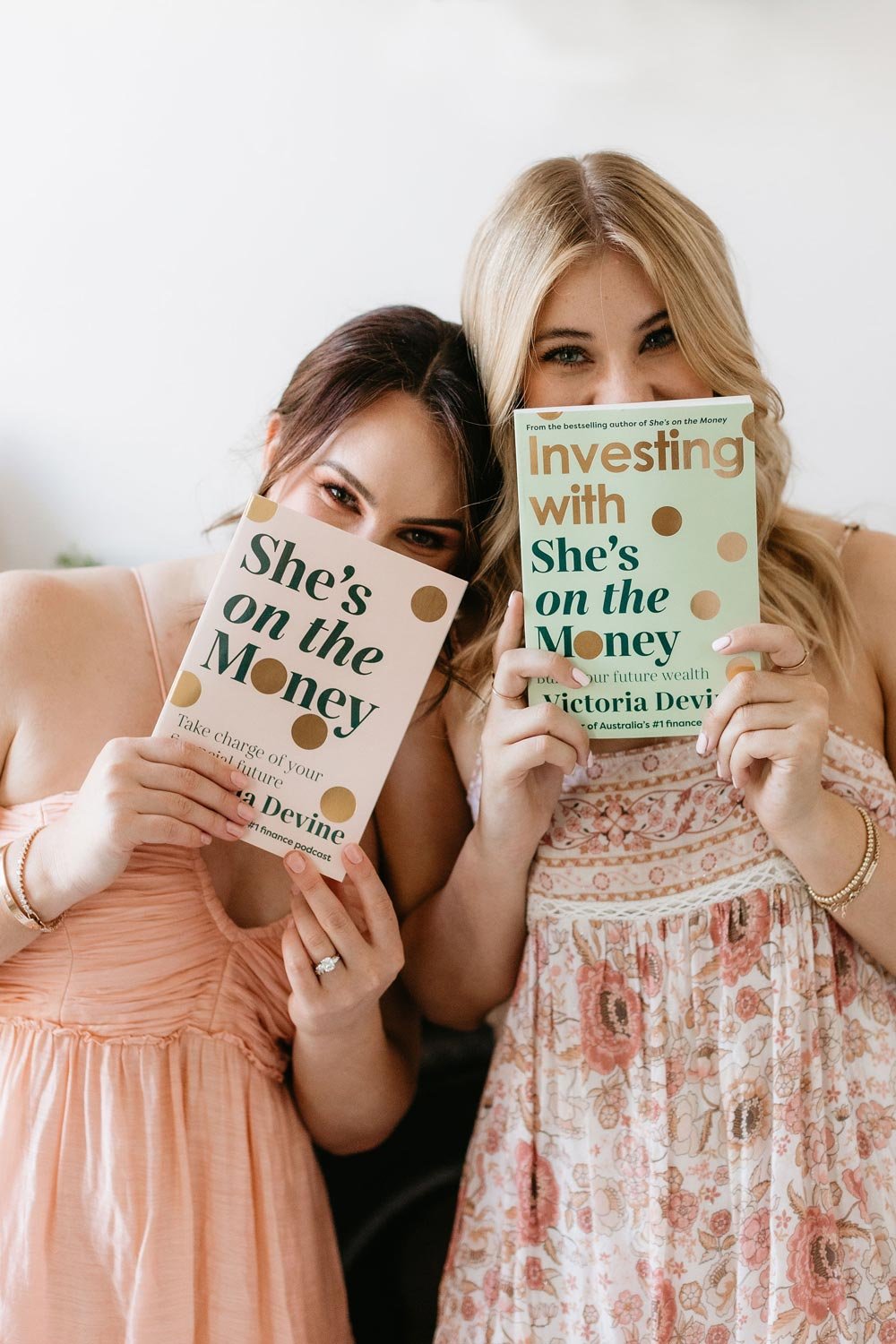 Victoria Devine &amp; Jess holding She's on the Money published books