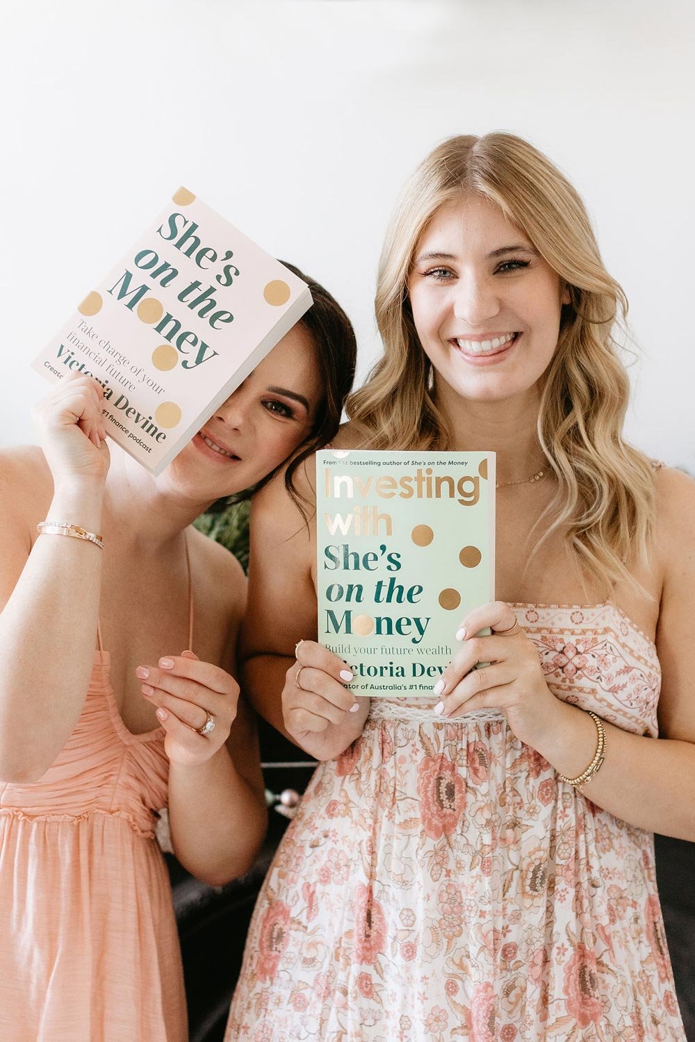 Victoria Devine &amp; Jess holding She's on the Money published books