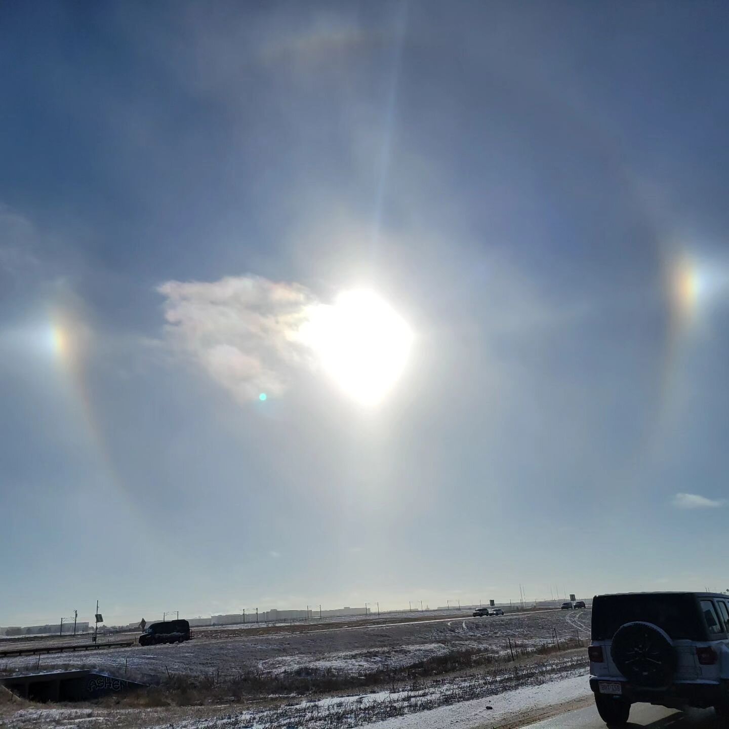 Anyone ever hear of a sun dog or see one? I didn't get a very good vibrant picture when I first noticed it but got this nice blurry one showing the full circle! 

A sundog happens when I freeing cold outside and water vapor is froze in the atmosphere