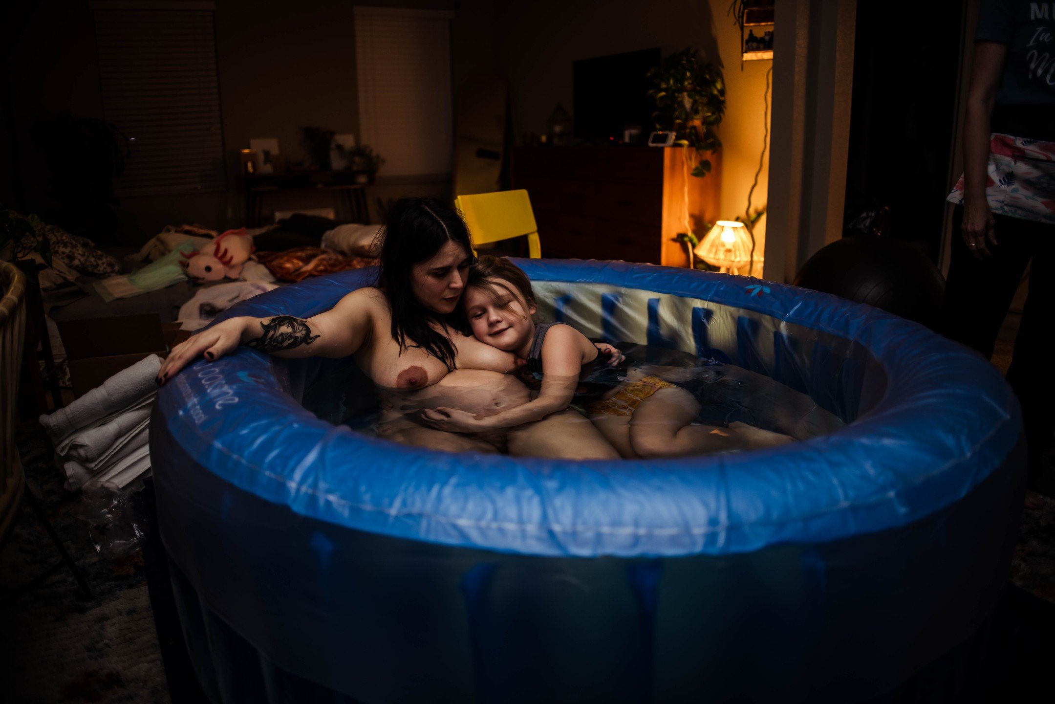 Going back and revisiting galleries from the past and remembering how special each individual story truly is. 

This incredible big sister woke up in the wee hours of the morning while her Momma was in transition. She immediately got into the pool wi