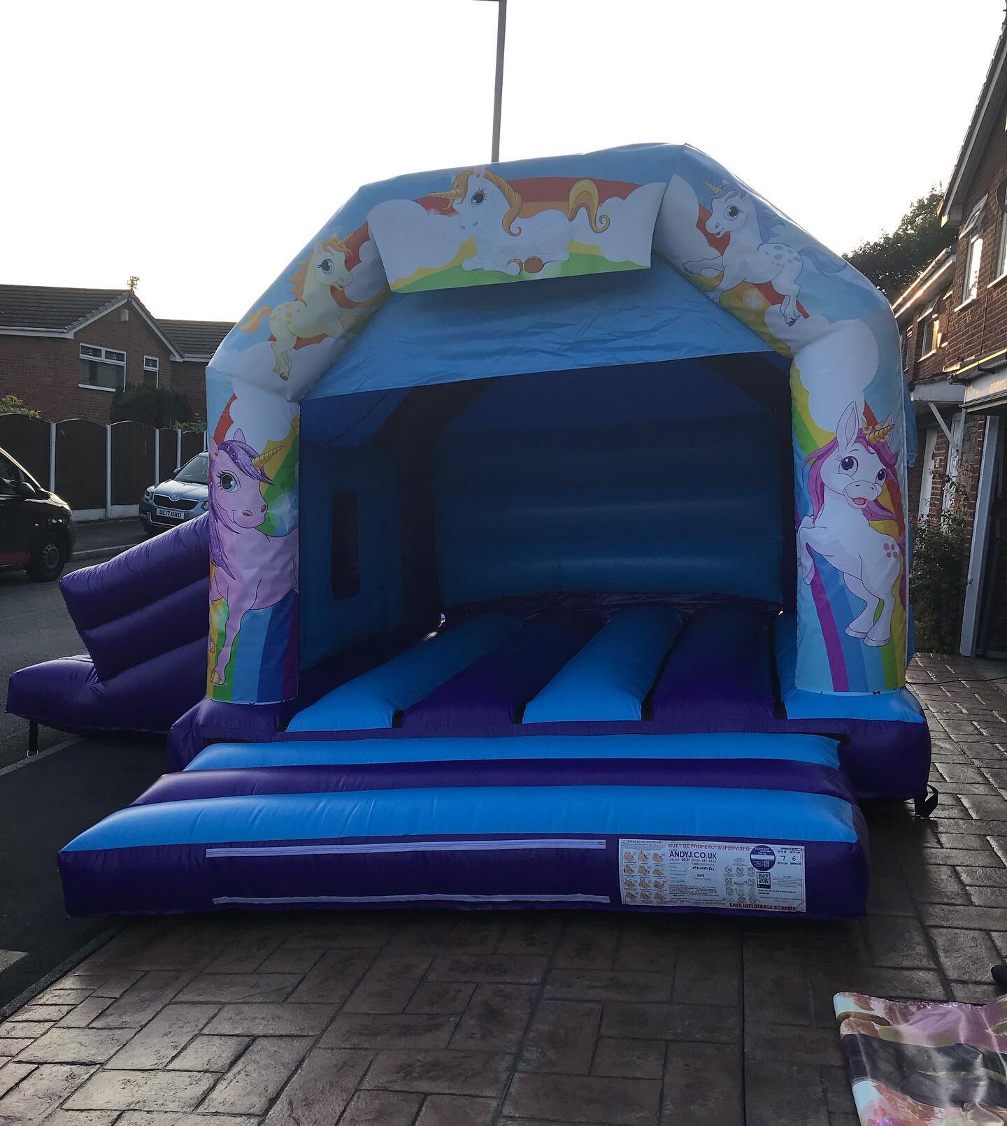 We have a unicorn castle with a slide available to rent