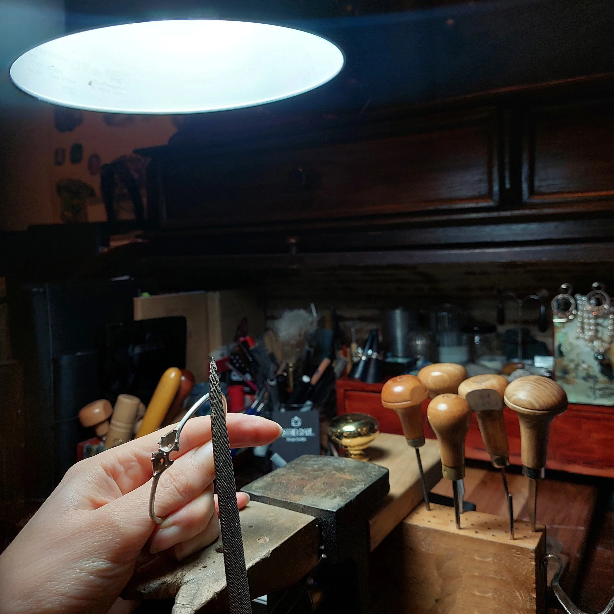 Hand making jewellery in Melbourne workshop