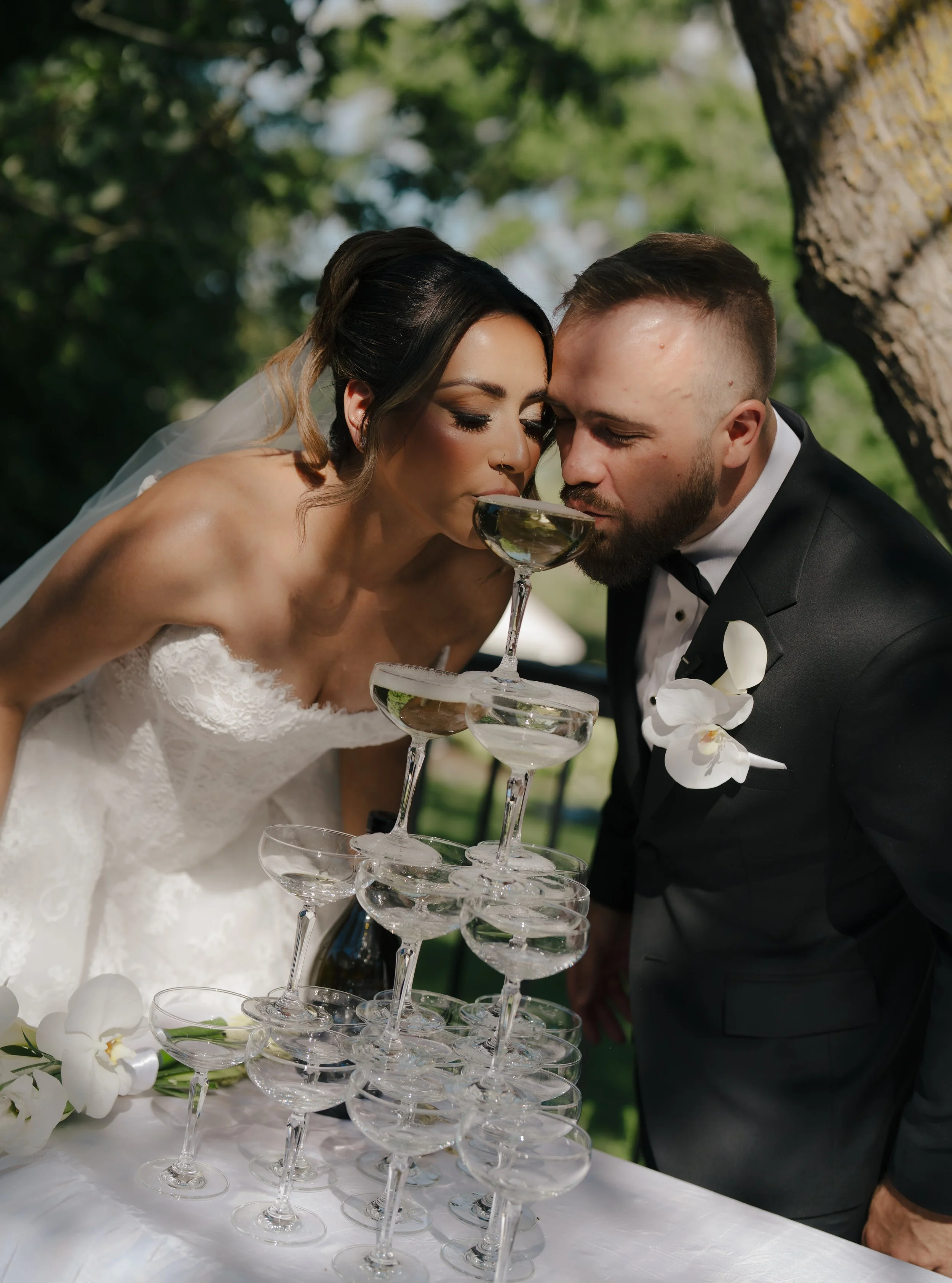 Romantic white and blue hydrangea tablescape with layered candles and modern décor, created by Dereves, a Toronto wedding planner and florist known for elevated wedding flowers Toronto.