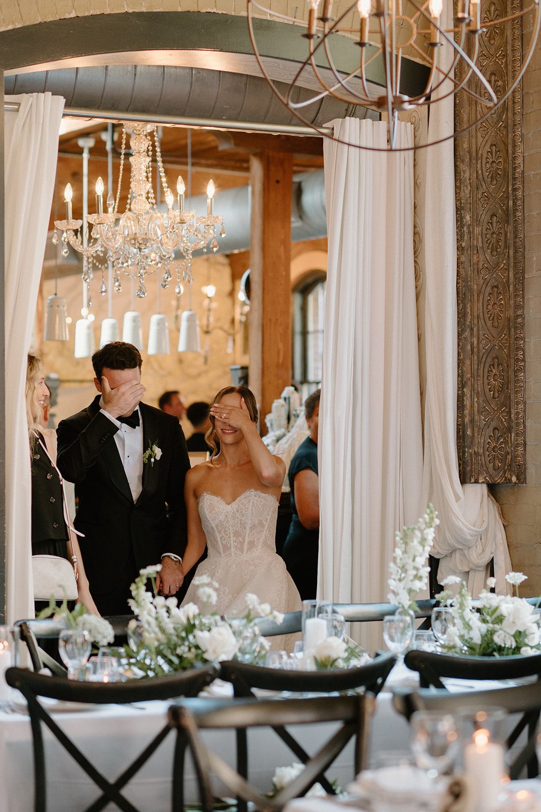 Bride and groom entering their reception with everything running perfectly on schedule thanks to Dereves, a Toronto wedding coordinator known for month-of coordination, timeline management, and stress-free event execution