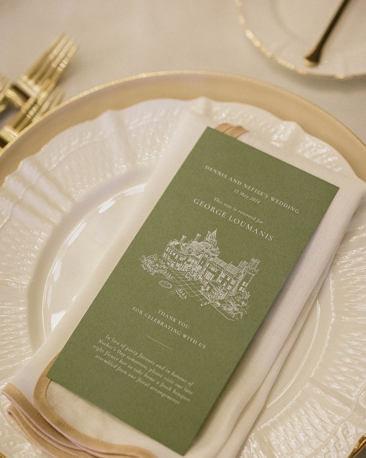 Modern tablescape at an intimate downtown Toronto venue styled by Dereves Studio with candles and airy florals.