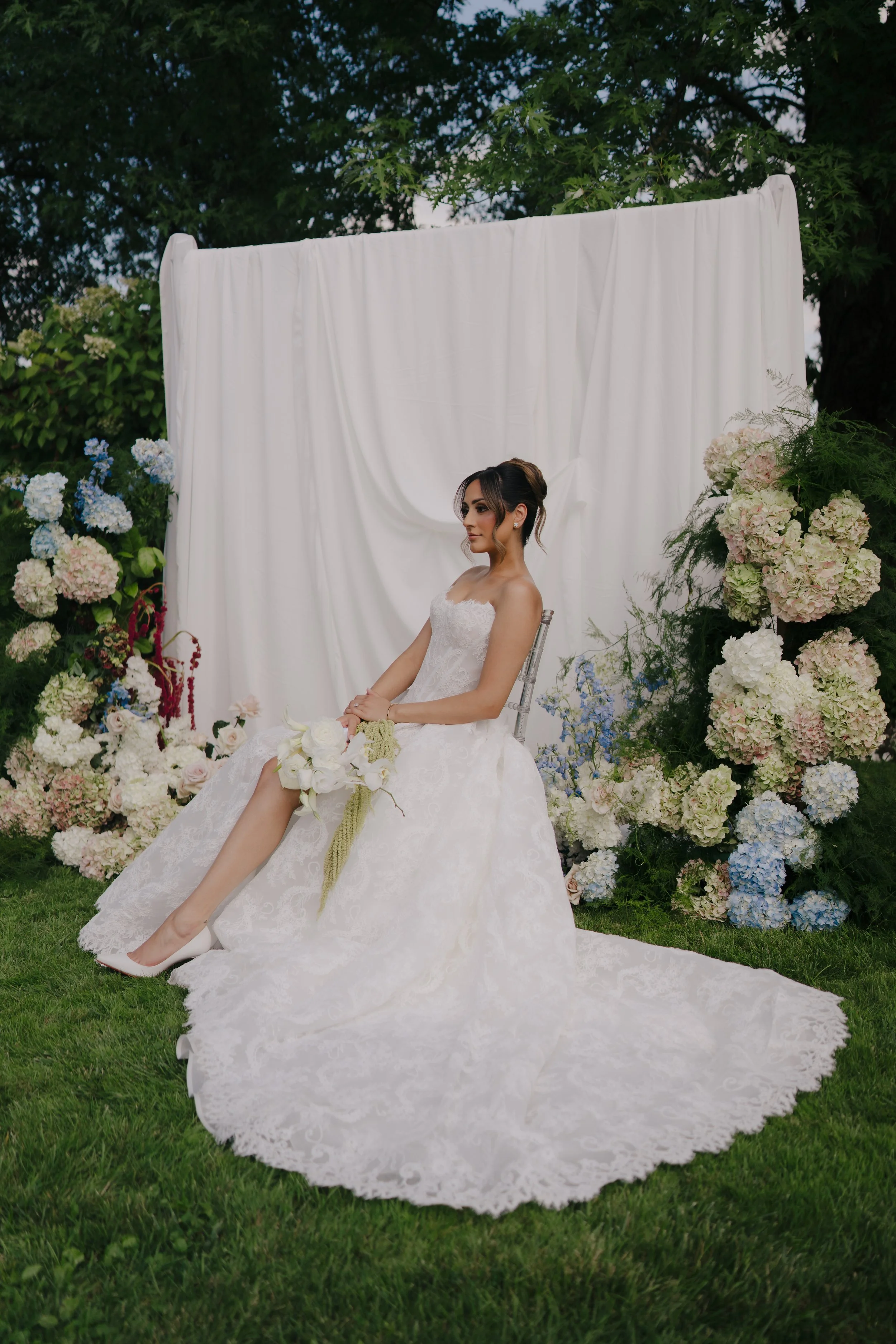Romantic draped reception space paired with premium florals created by Dereves Studio, luxury wedding planner Toronto.