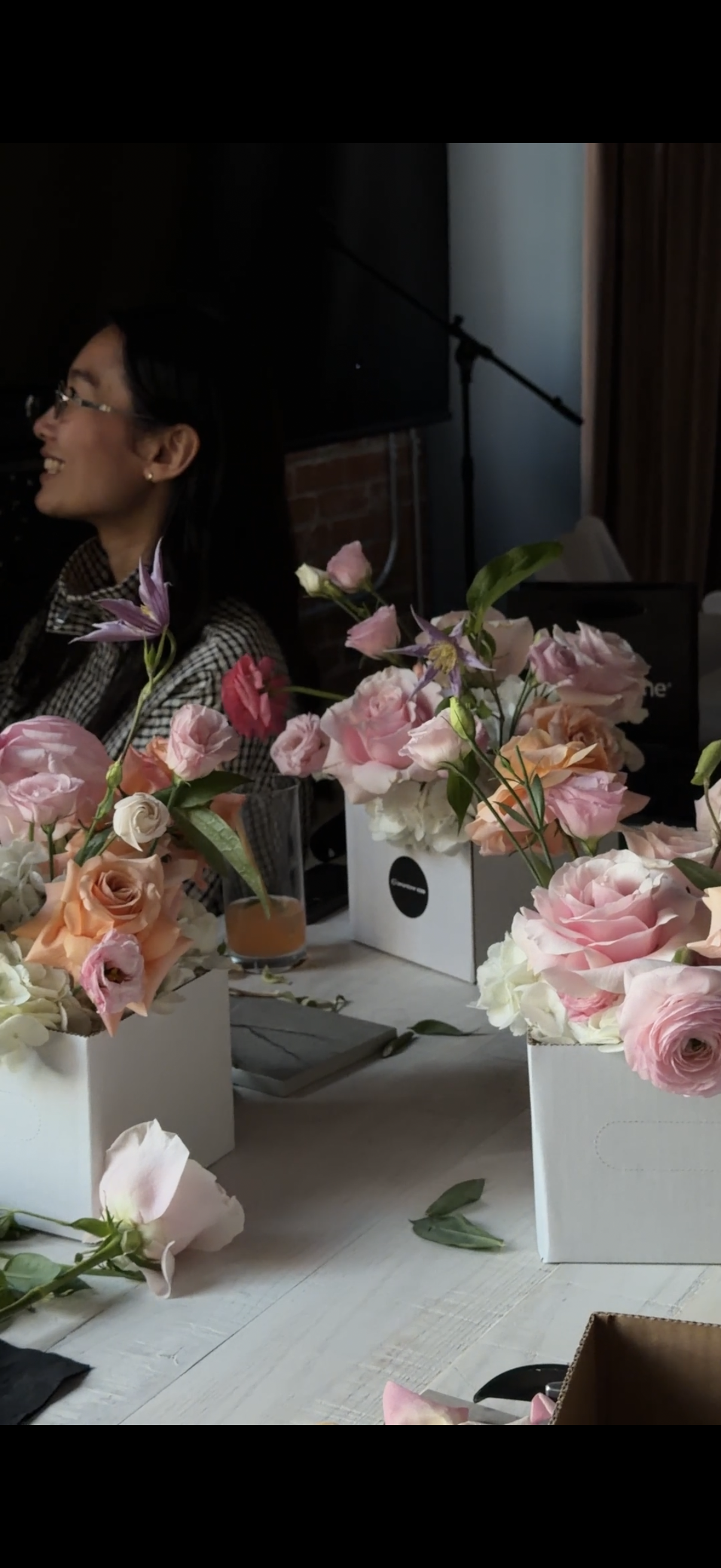 Corporate guests designing floral arrangements during a hands-on Flower Socials workshop in Toronto.