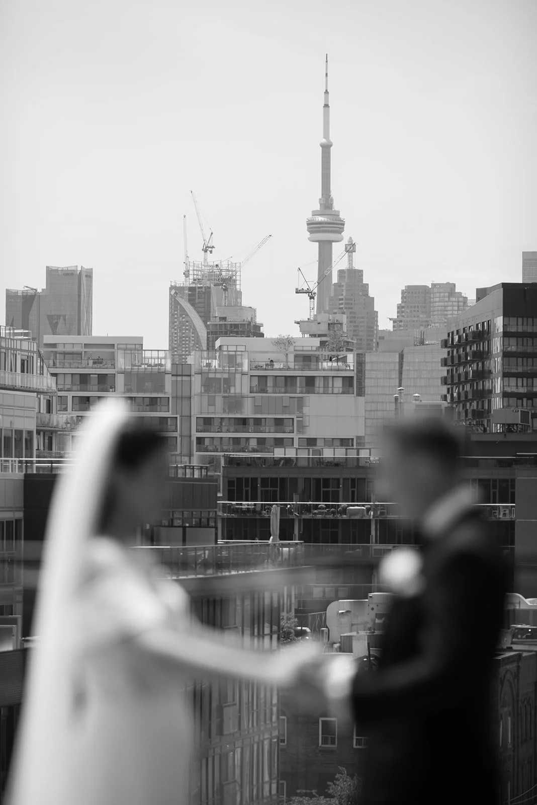 First look with Toronto CN tower views for wedding best toronto florist