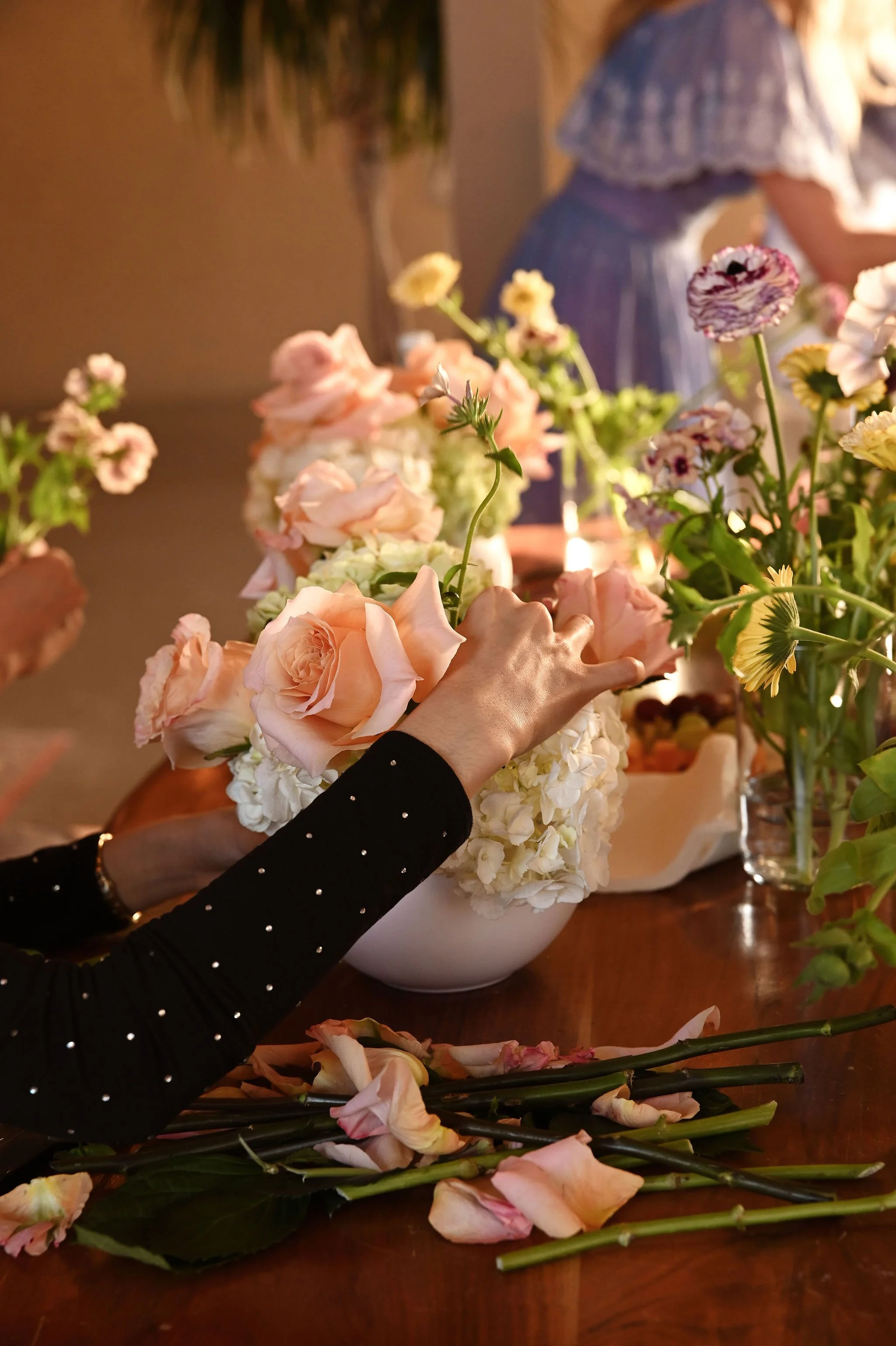 Branded corporate floral experience in Toronto with custom flowers, logo details and interactive guest participation created by Derêves Studio.