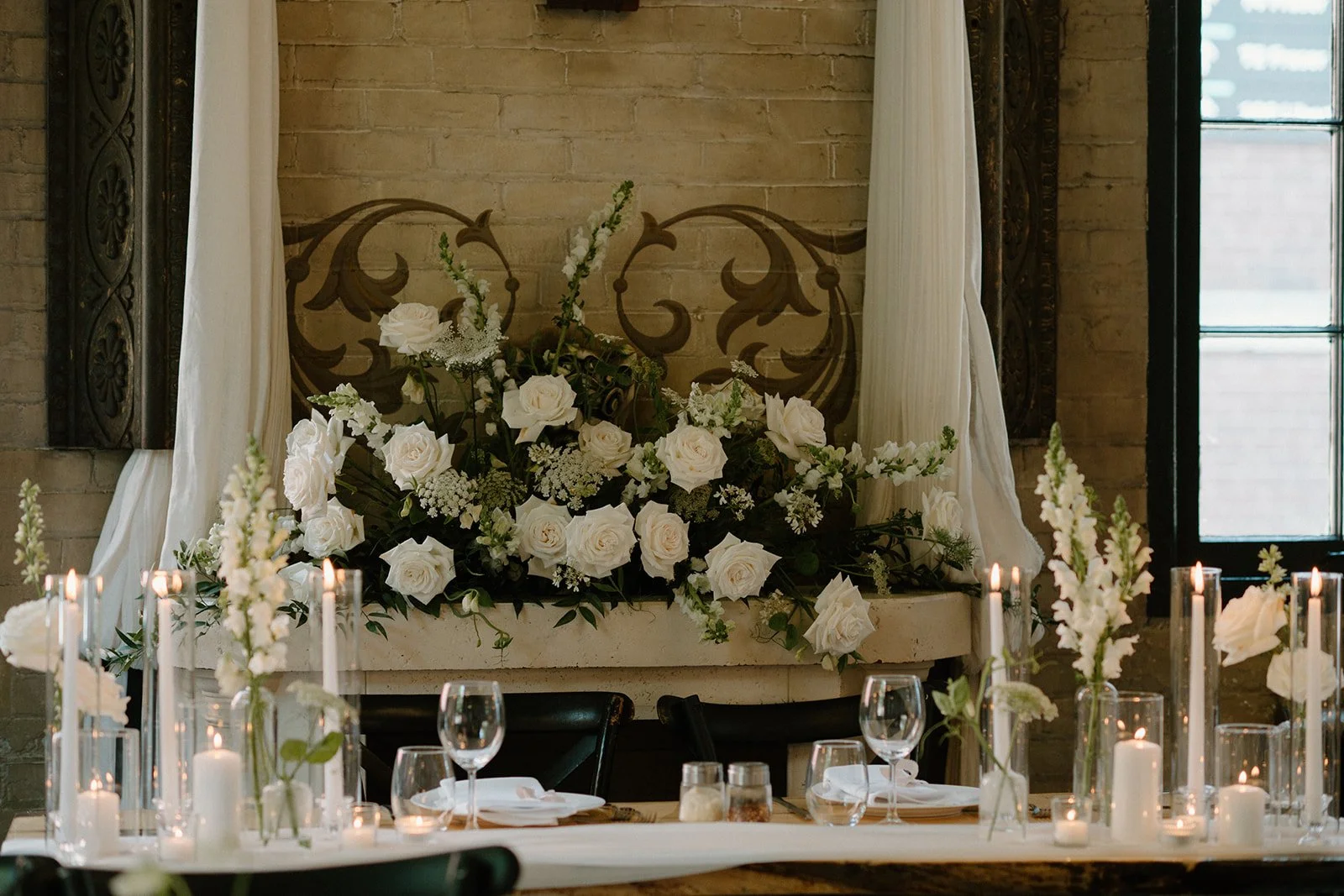 High-end white floral arrangement with rich volume styled by Dereves Studio, perfect for expensive-looking Toronto weddings
