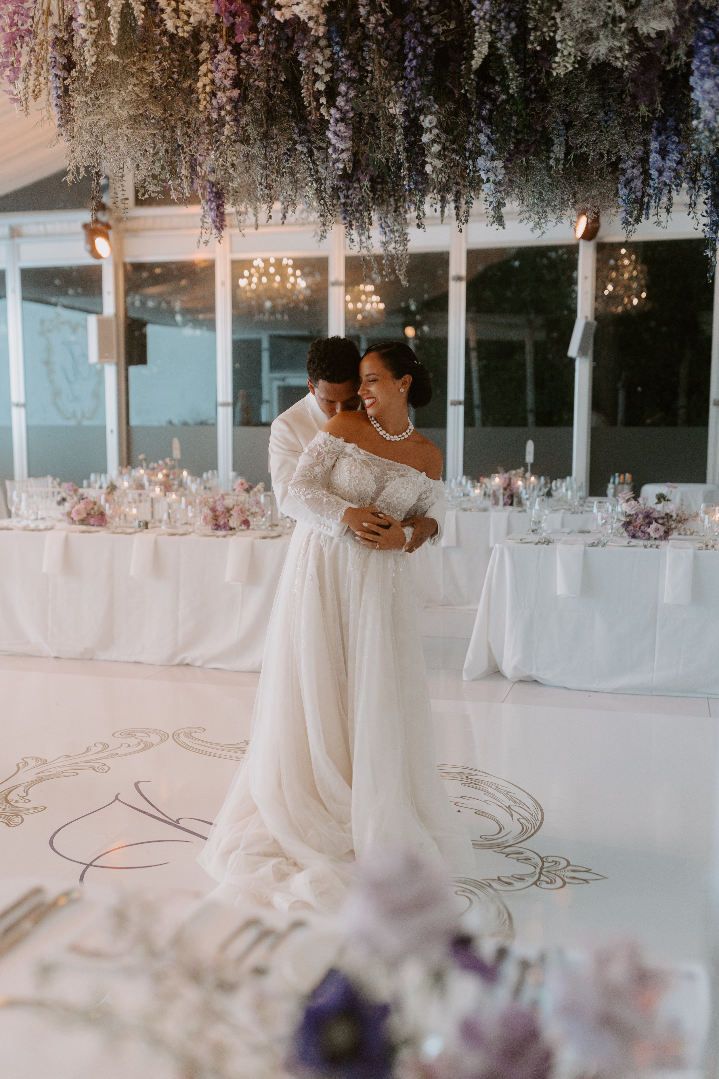 Casa Loma wedding reception transformed with suspended florals, luxury table décor and sustainable modern floral arrangements in Toronto.