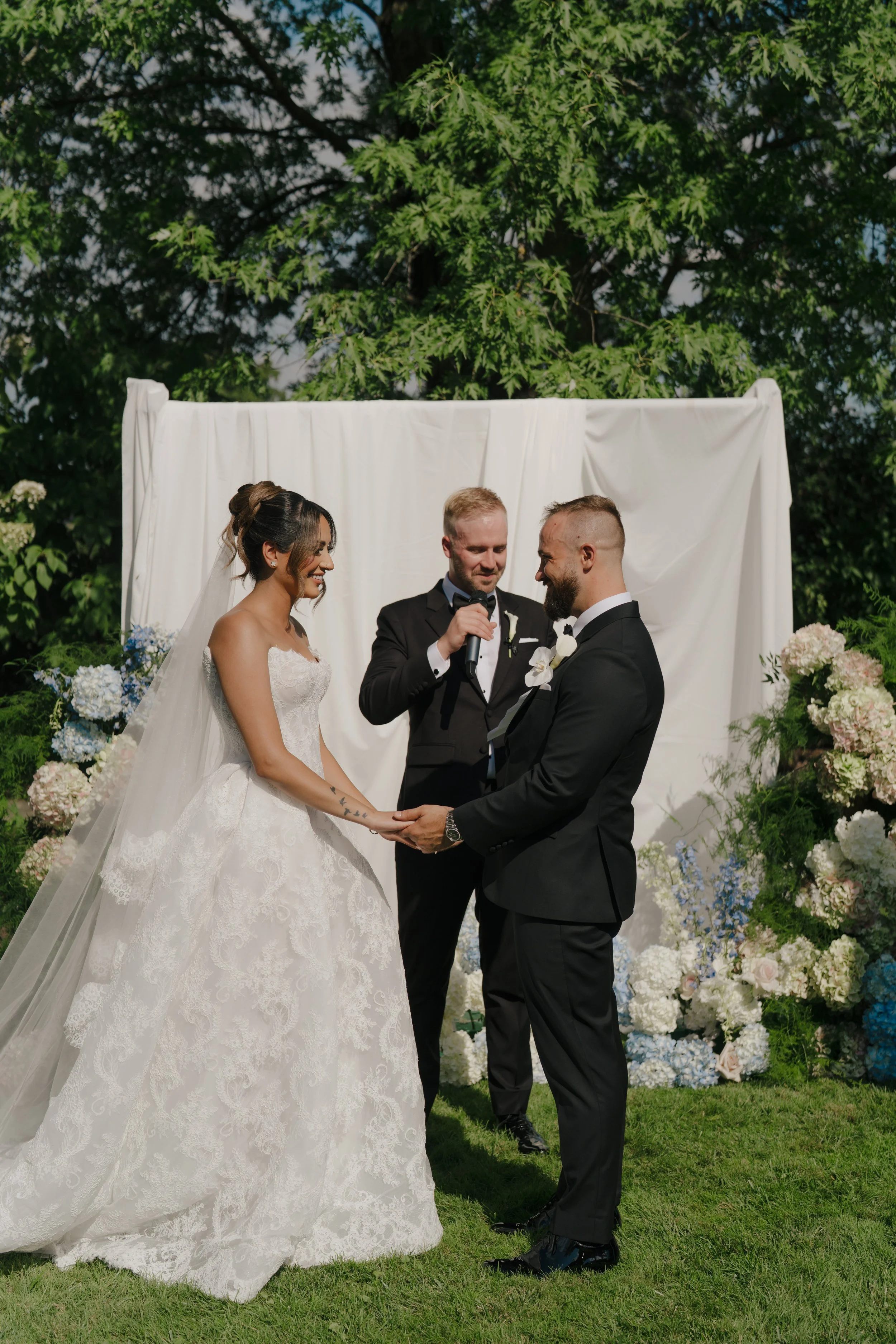 Soft blue hydrangea arrangements paired with crisp white florals designed by Dereves Studio, representing our signature modern wedding design Toronto and elevated floral details.