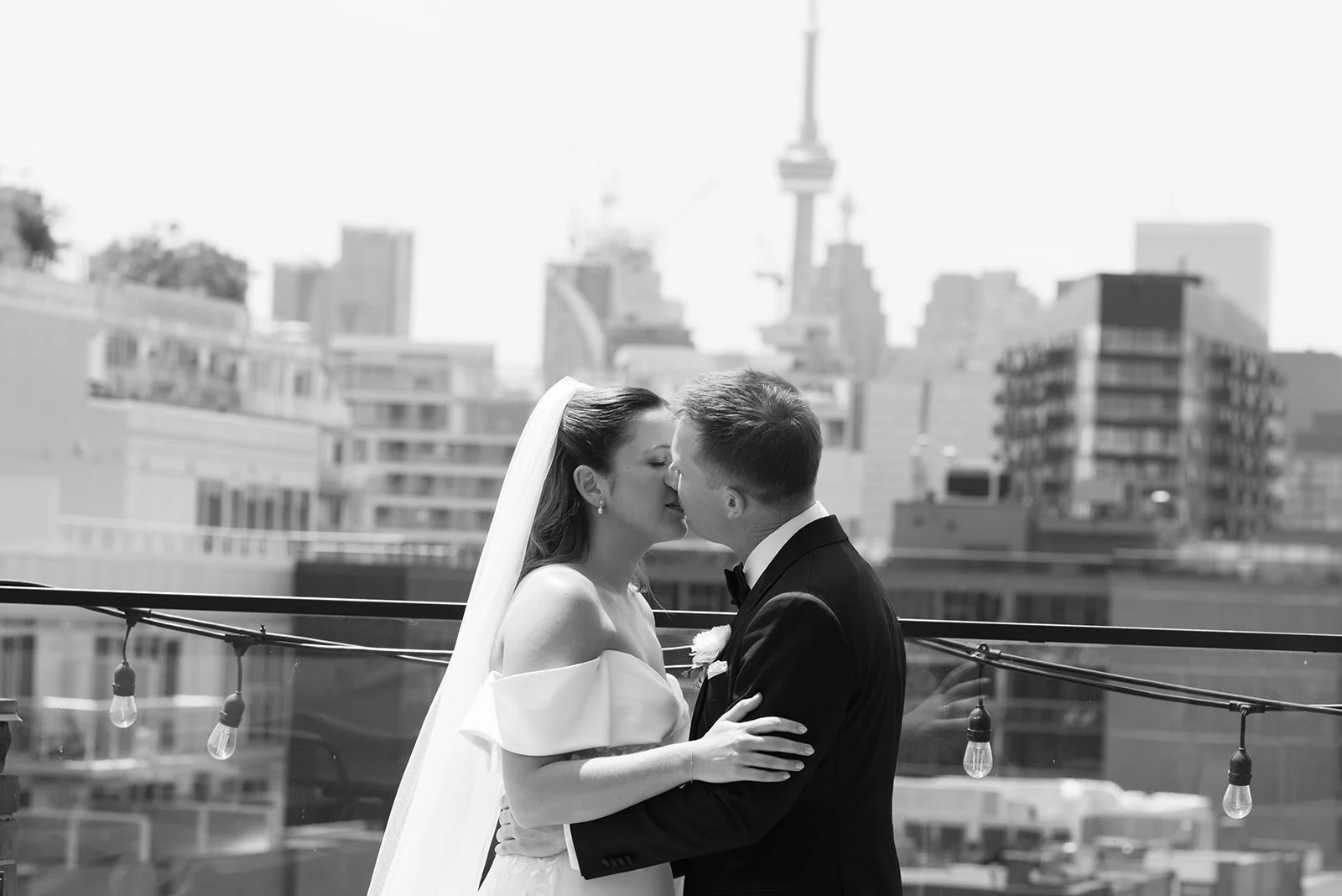 Elegant Toronto wedding reception with layered florals, candlelight and thoughtful guest details managed through full-service wedding planning and design. wedding planning at broadview hotel toronto