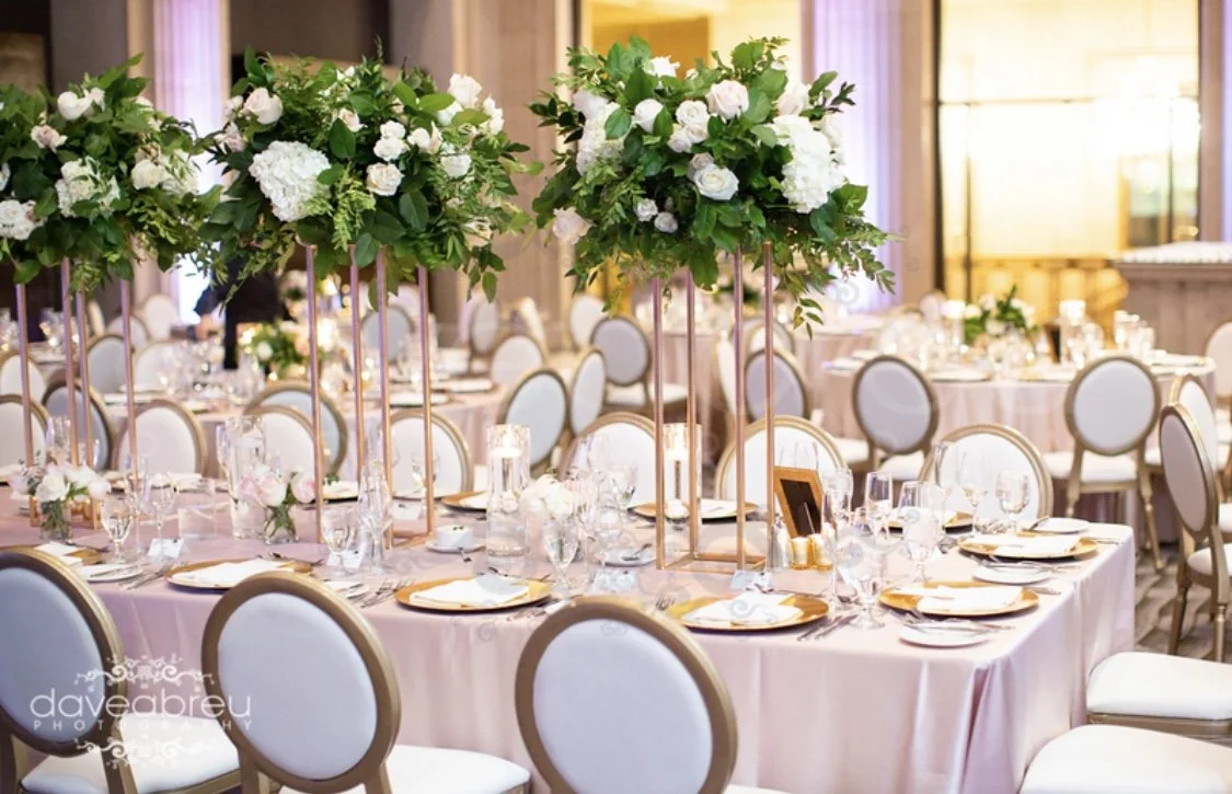 Whimsical wedding florals with airy textures and candlelit accents created by Dereves Studio, best wedding florist in Toronto for intimate restaurant weddings