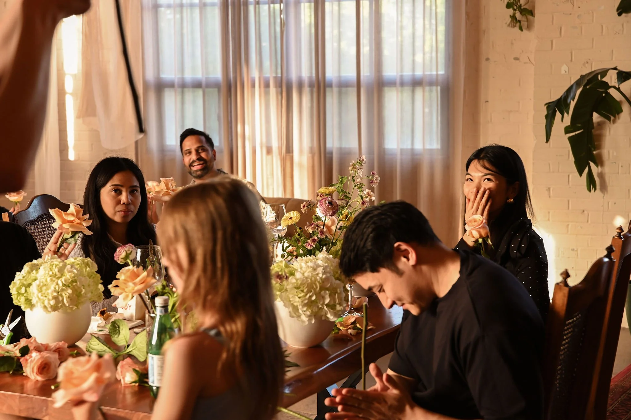 A Toronto floral workshop featuring fresh flowers, vases, and hands-on instruction.