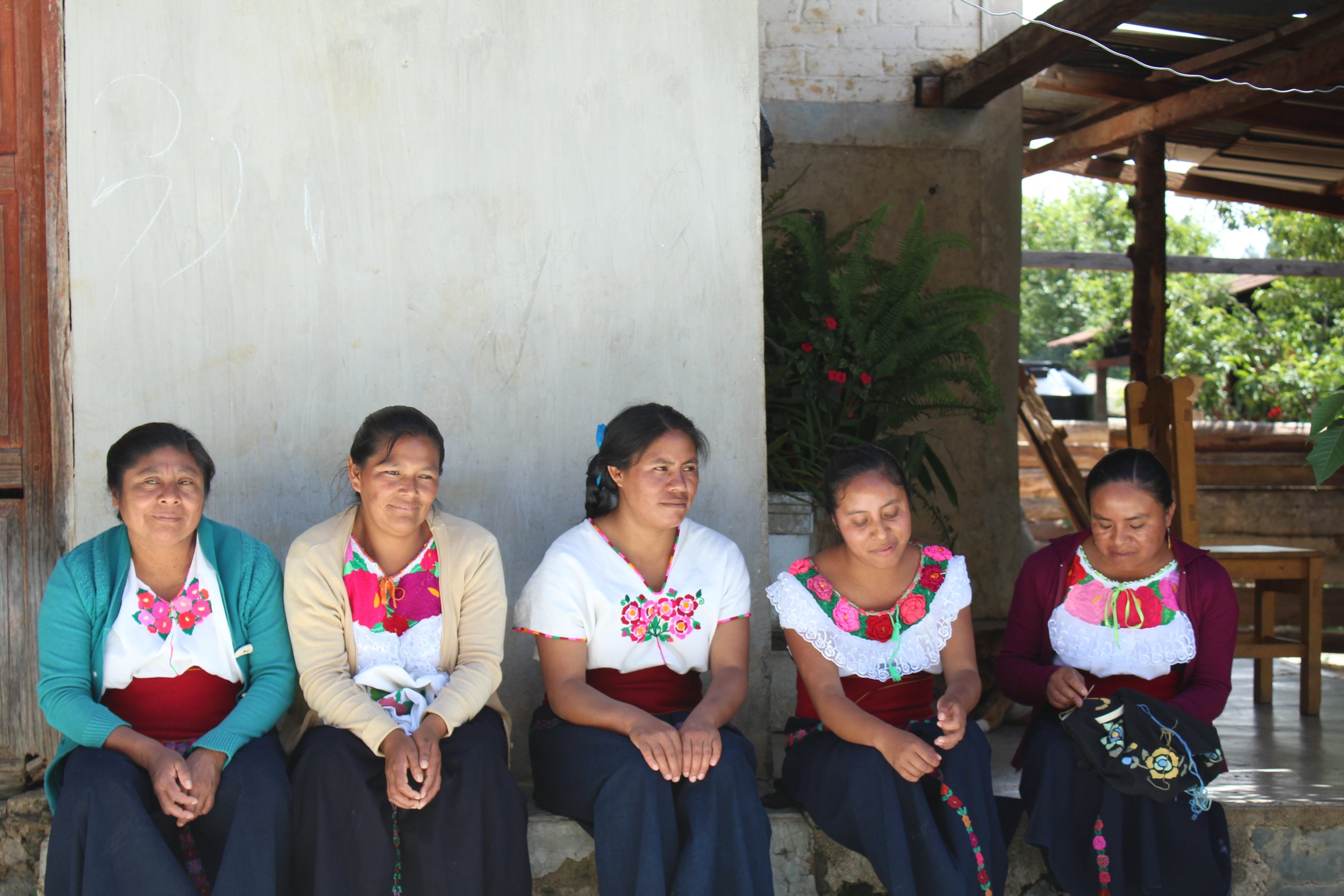 Woman of Las Dalias artisan cooperative from Huixtan village of Chiapas, Mexico. The group specializes in floral embroidery work.