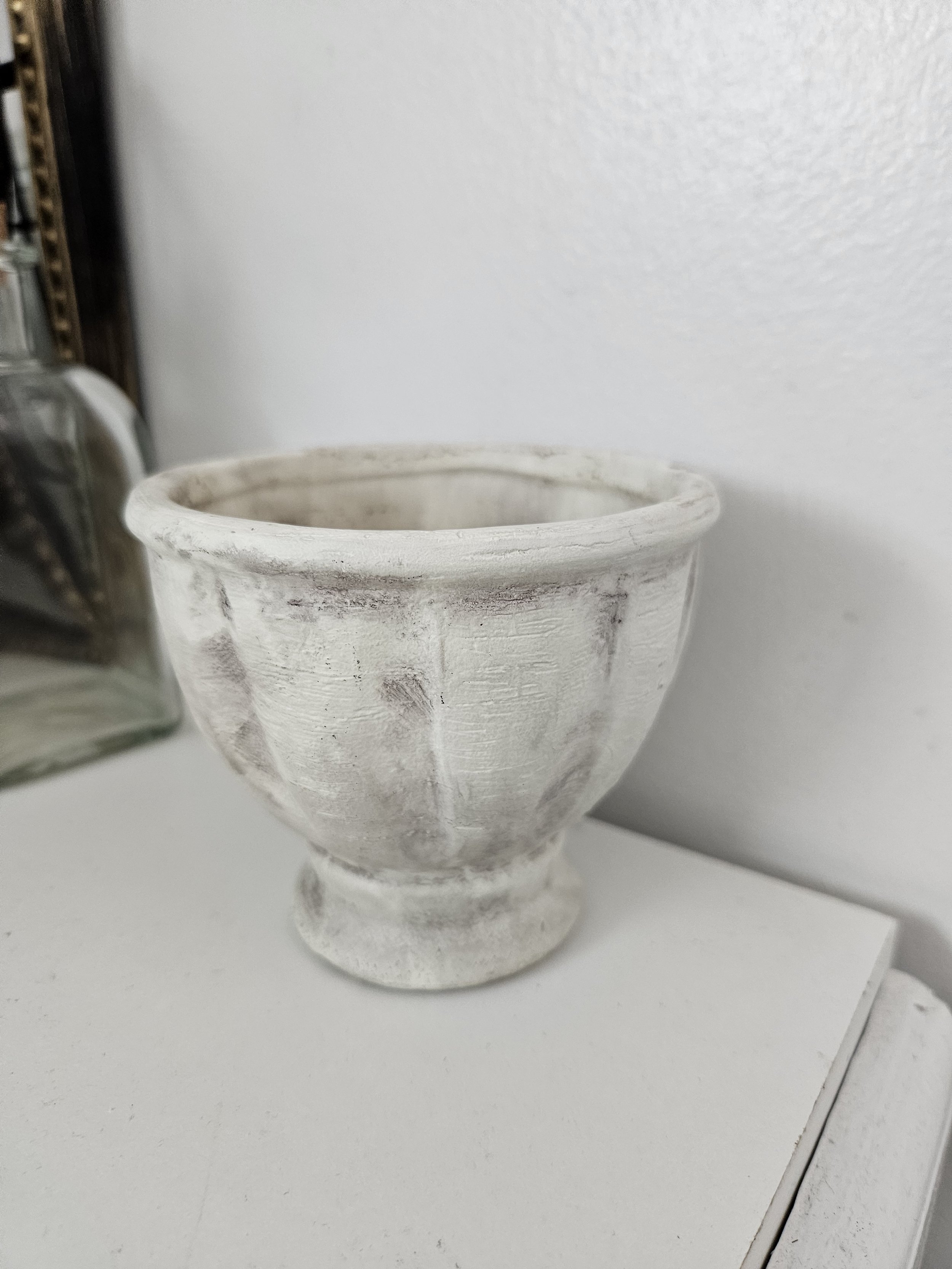 small white ceramic planter