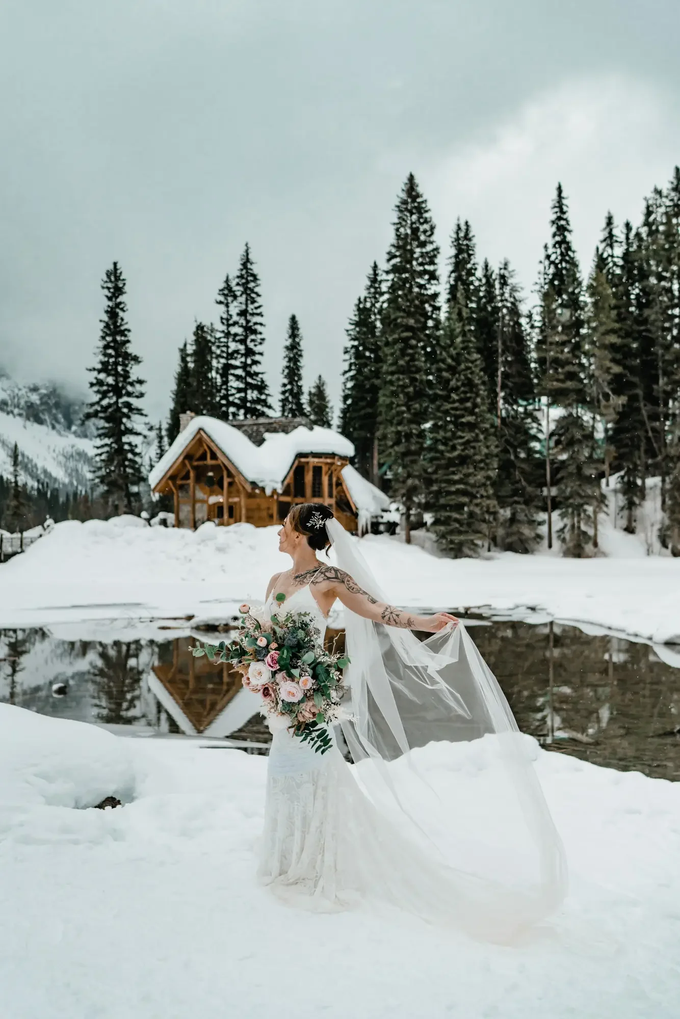 winter-elopement-photography-at-emerald-lake-lodge22.webp