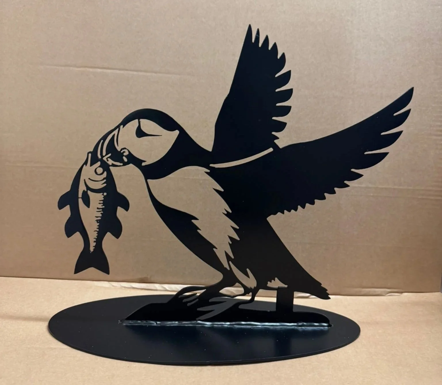 Metal puffin garden ornamnent