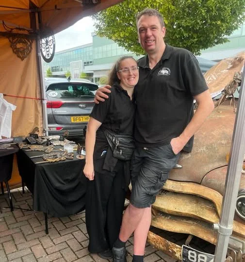 Leanne and Matt of Farm Truck Designs beside their Chevrolet pickup at Bents Artisan Market
