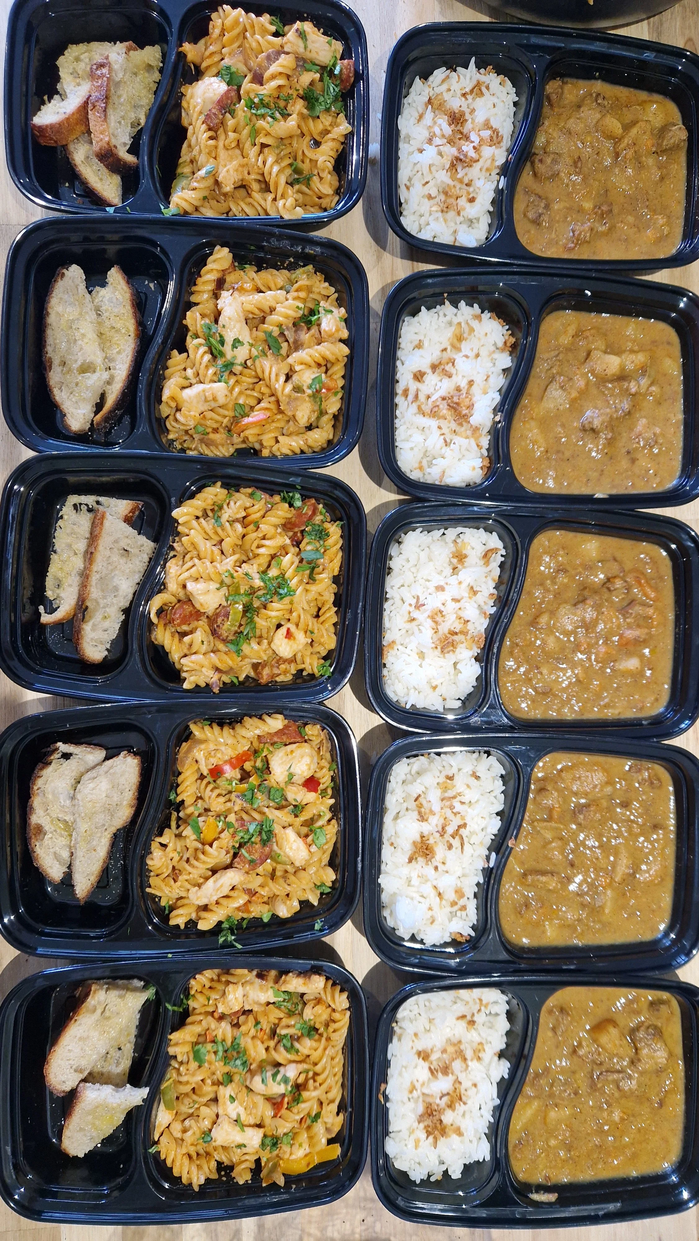 Chef-prepared pasta and rice meals, individually portioned for the week.