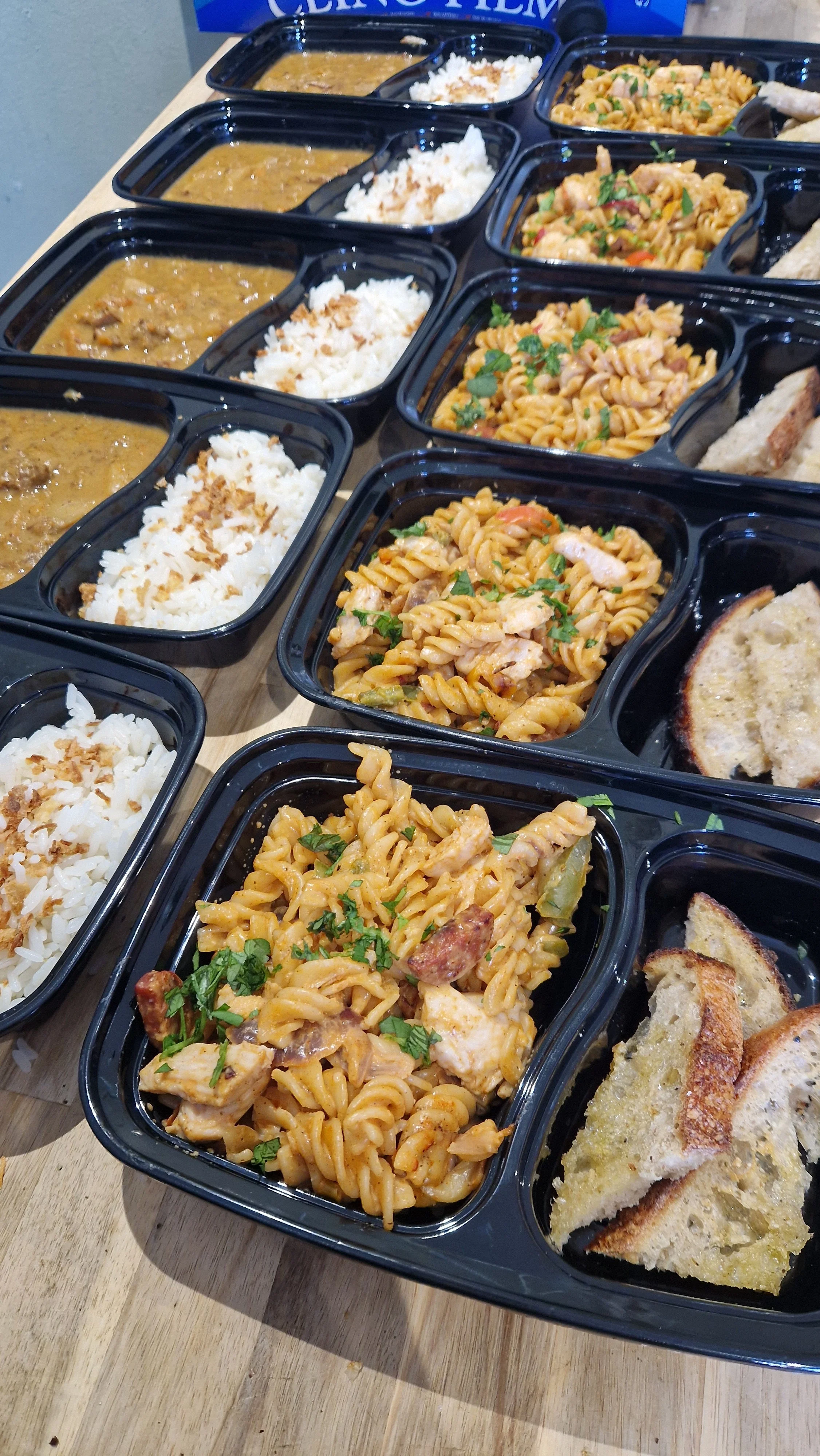A batch of individually portioned, chef-made meals.