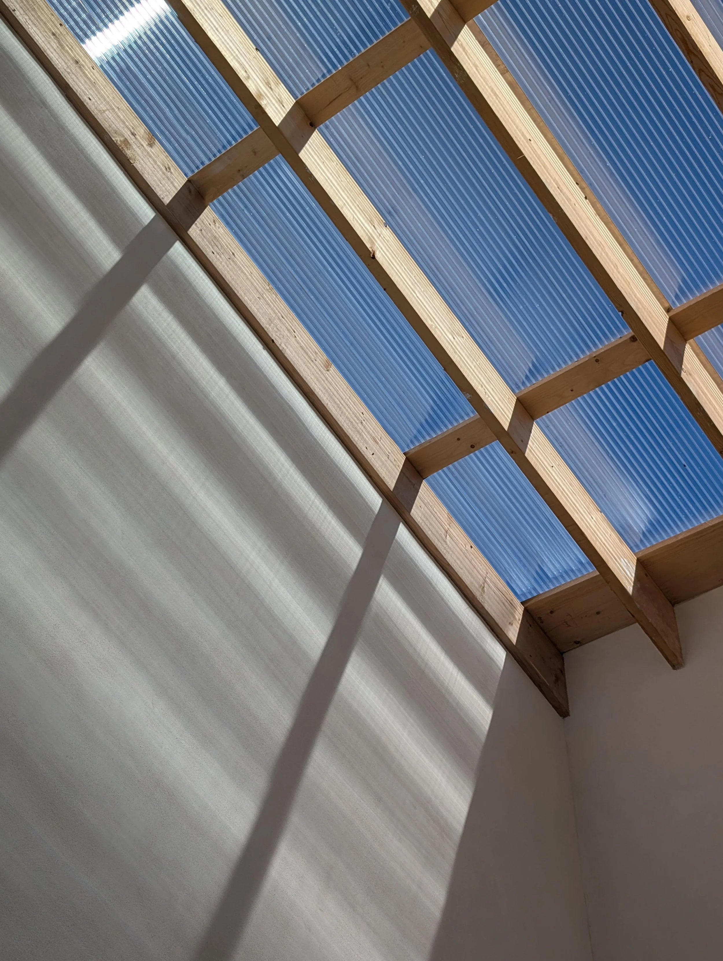 Puits de lumière terrasse et bois