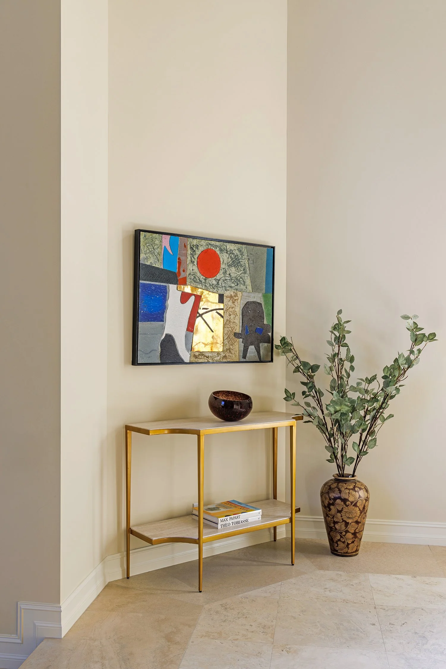 natura-interiors-palm-beach-gardens-foyer-with-console-and-modern-artwork_web.jpg