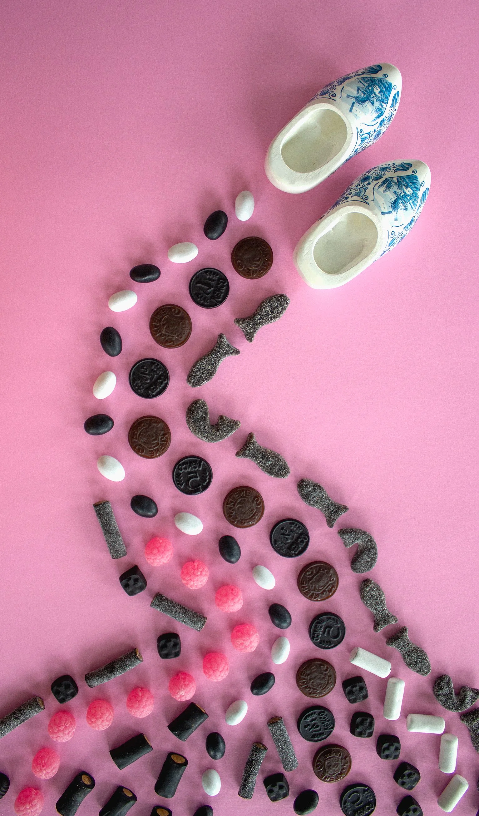 A trail of treats follows a pair of clogs