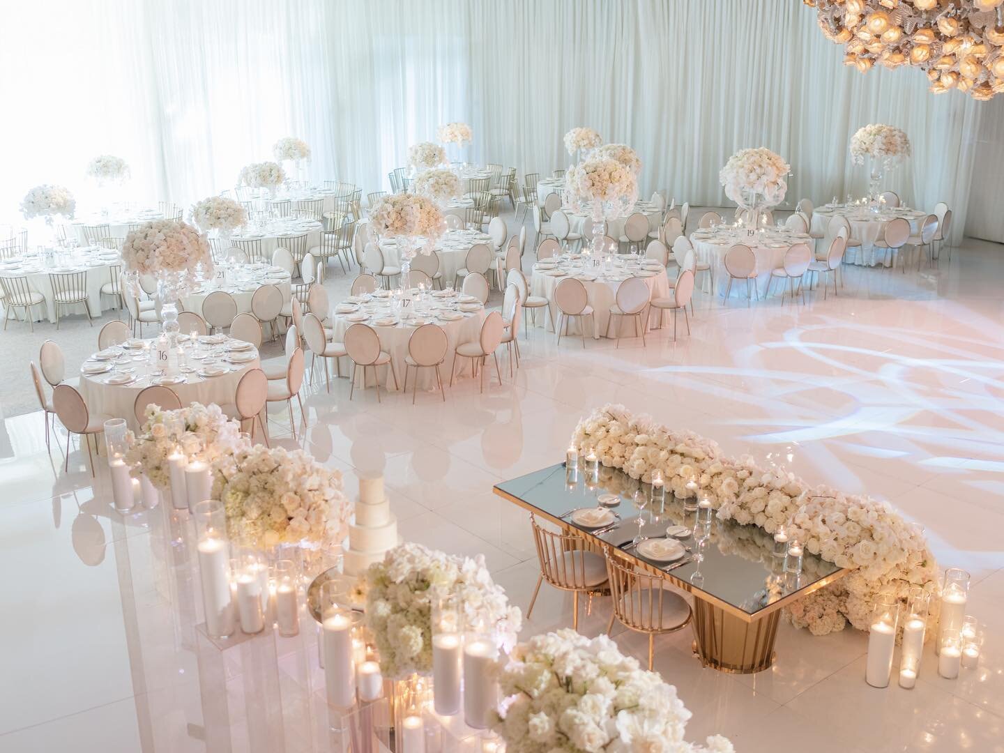 A sea of white perfectly contrasted the guests all black dress code for Karla &amp; Vince&rsquo;s reception at the iconic Beverly Hills Hotel ballroom #awpweddings
Floral: @tictockflorals 
Design: @eddiezaratsian 
Coordination: @melissaandre @madco_t