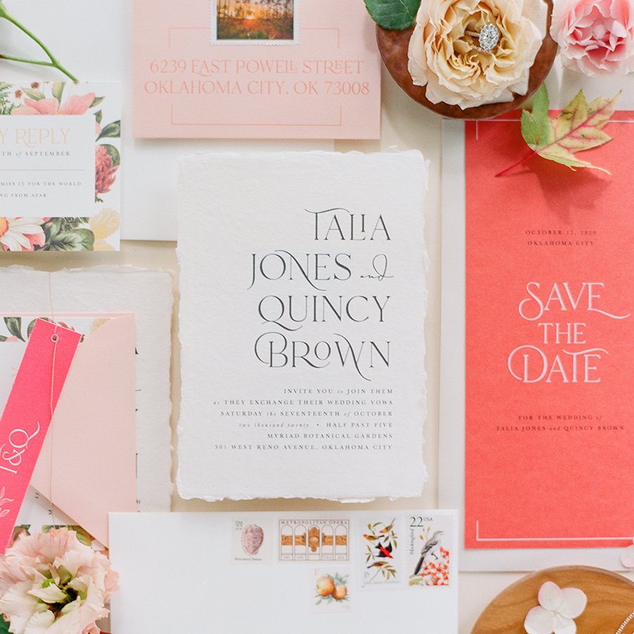 Flat lay invitation styling by luxury wedding photographer Amanda Watson