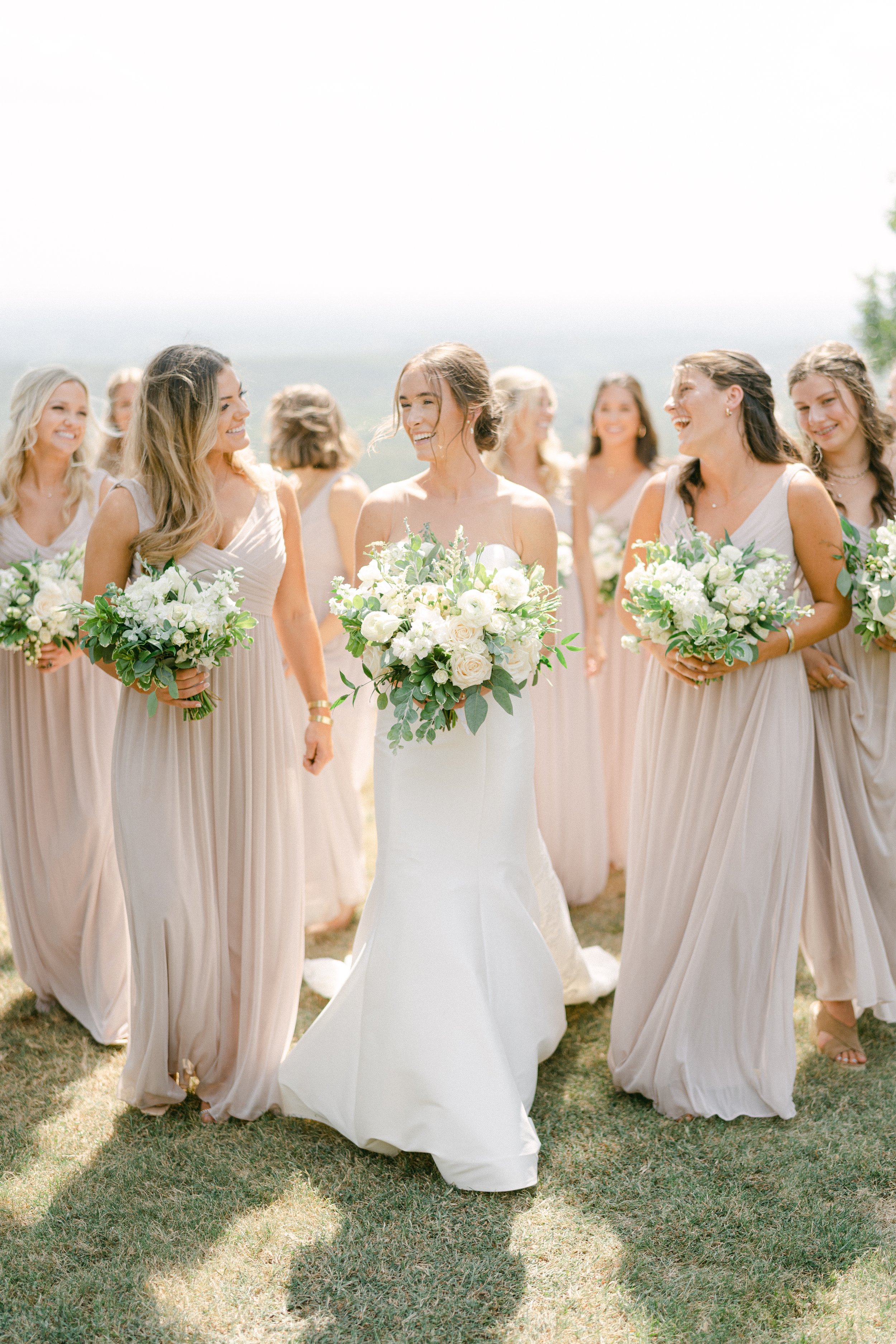 Romantic Aspen wedding on mountain top with bridesmaids in blush by luxury wedding photographer Amanda Watson