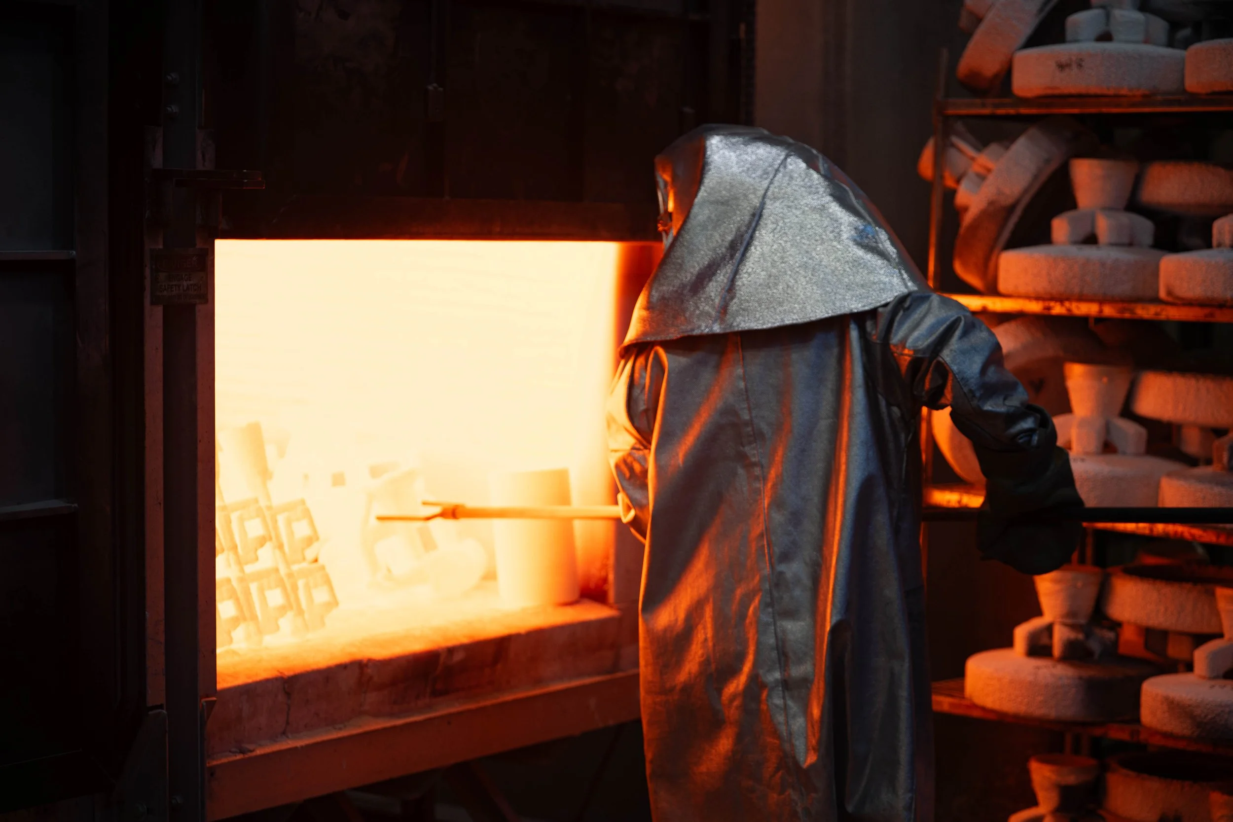 Super-heated Investment Casting shells are prepped for stainless steel pouring