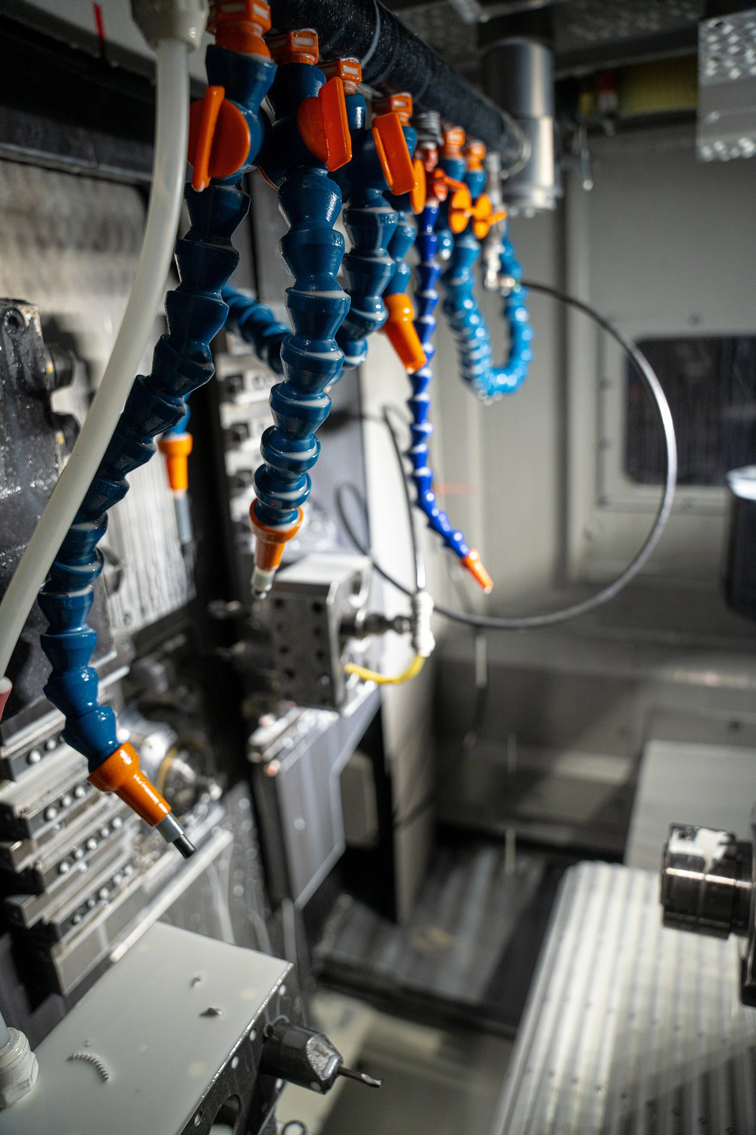 Inside of a Swiss Lathe at IPC Machining