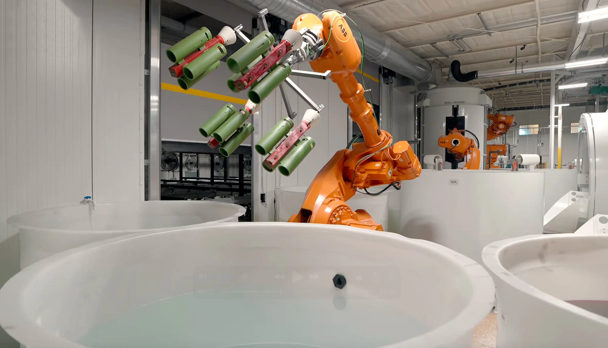 Automated shell formation at IPC Foundry Group's Texas Foundry. Here, they use robotics to assist in the investment casting process.