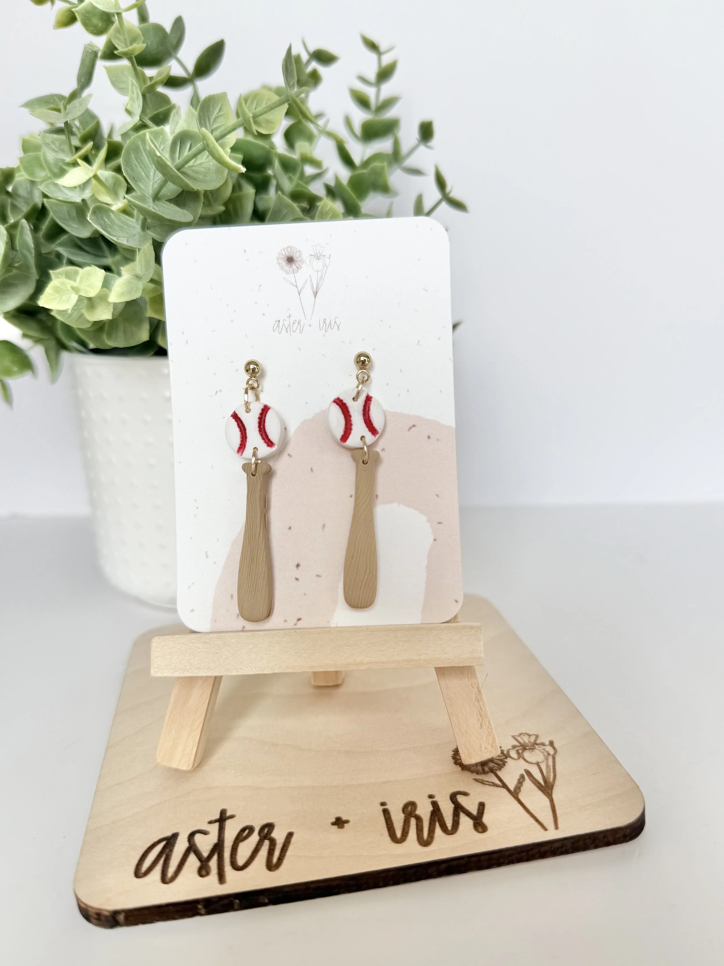 Baseball with bat dangle