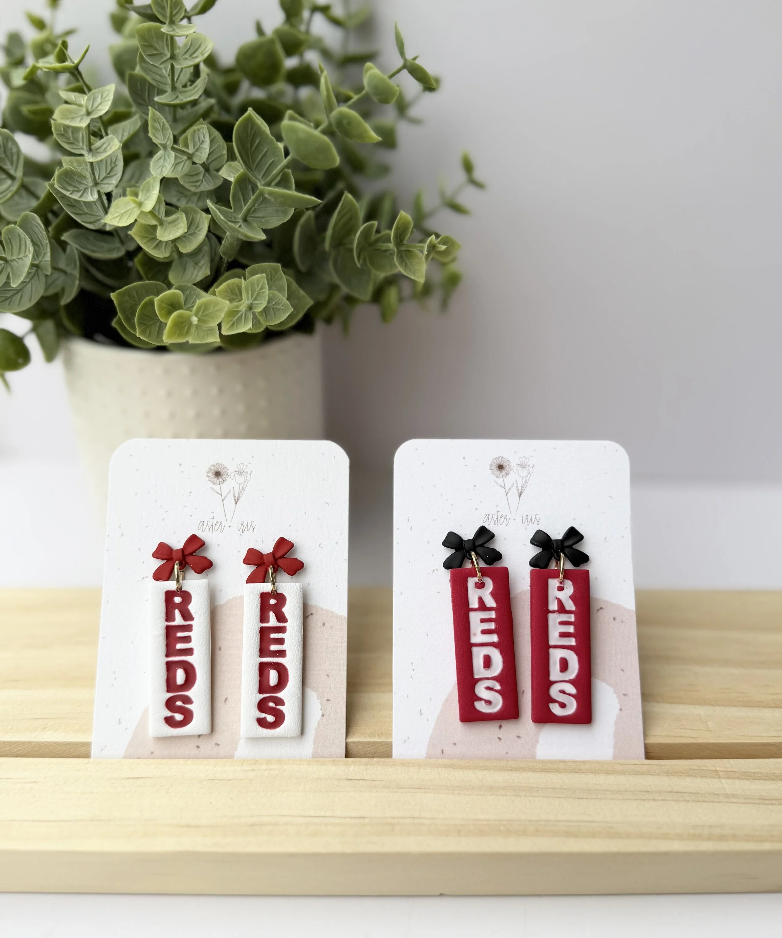 REDS bow tag dangle