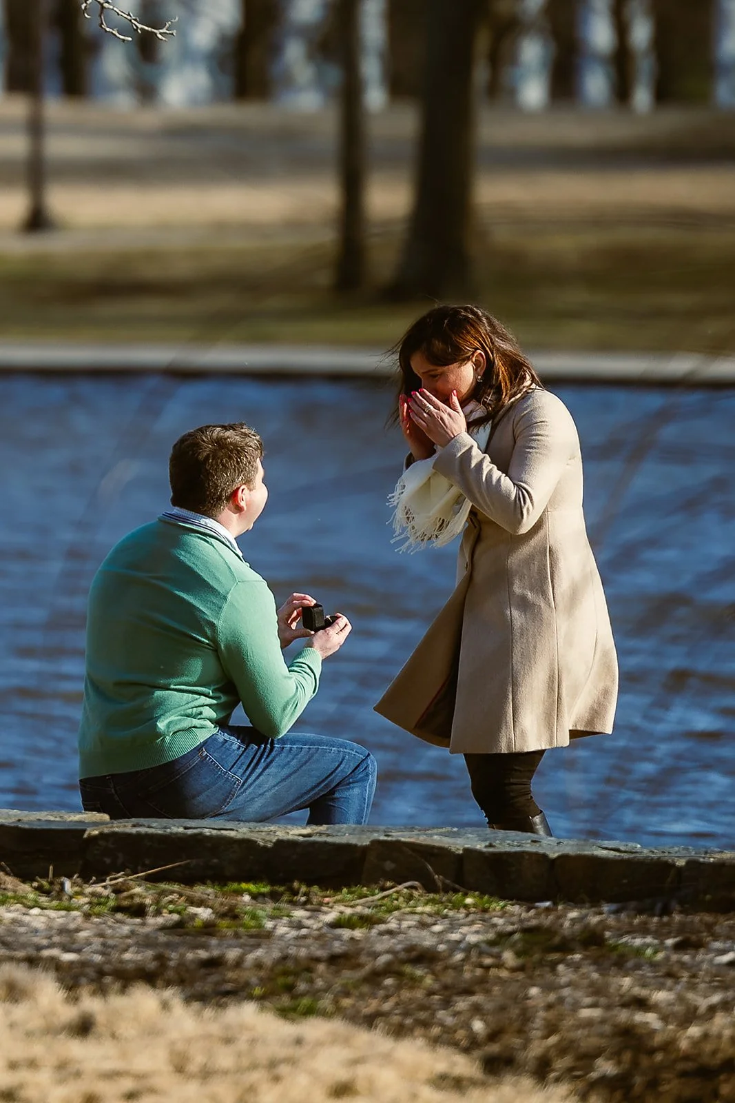 Man proposing to woman at Constitution Gardens in Washington DC
