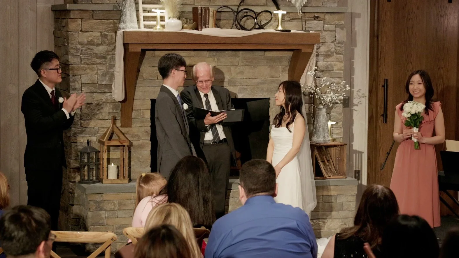 Bride and groom at alter in a wedding