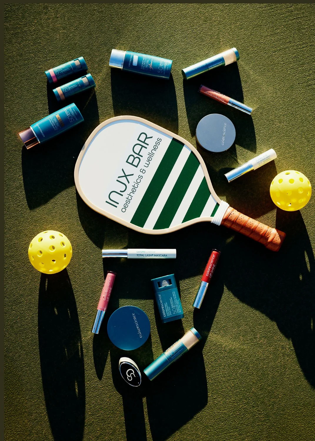 VI peels at INJX Bar aesthetics and wellness in Peoria AZ, displayed with Colorscience sunscreen products on a pickleball court.