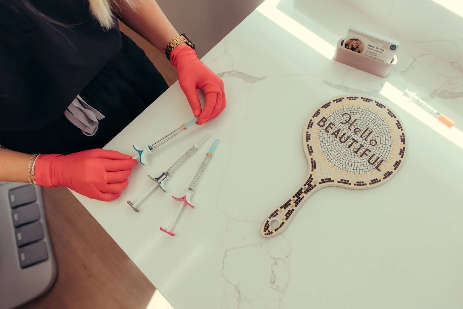 Facial filler before and after tools and supplies laid out at Injx Bar med spa near Peoria, AZ.