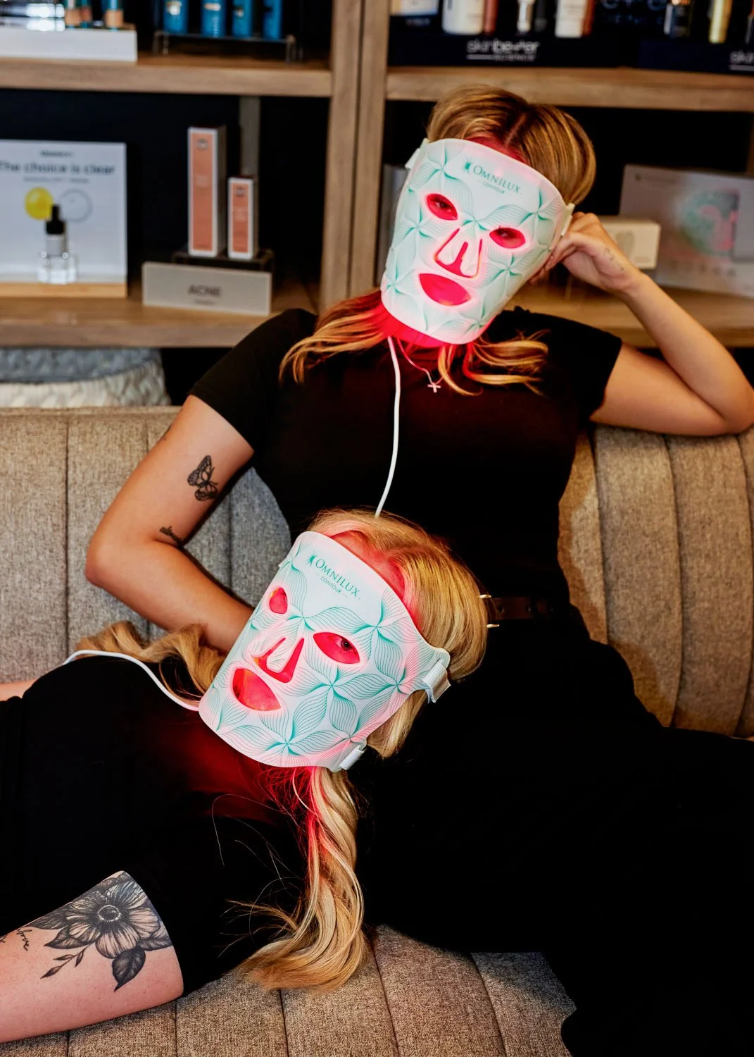 Woman wearing a red light therapy mask, representing the growing interest in red light therapy near Peoria, AZ for glowing, youthful skin.